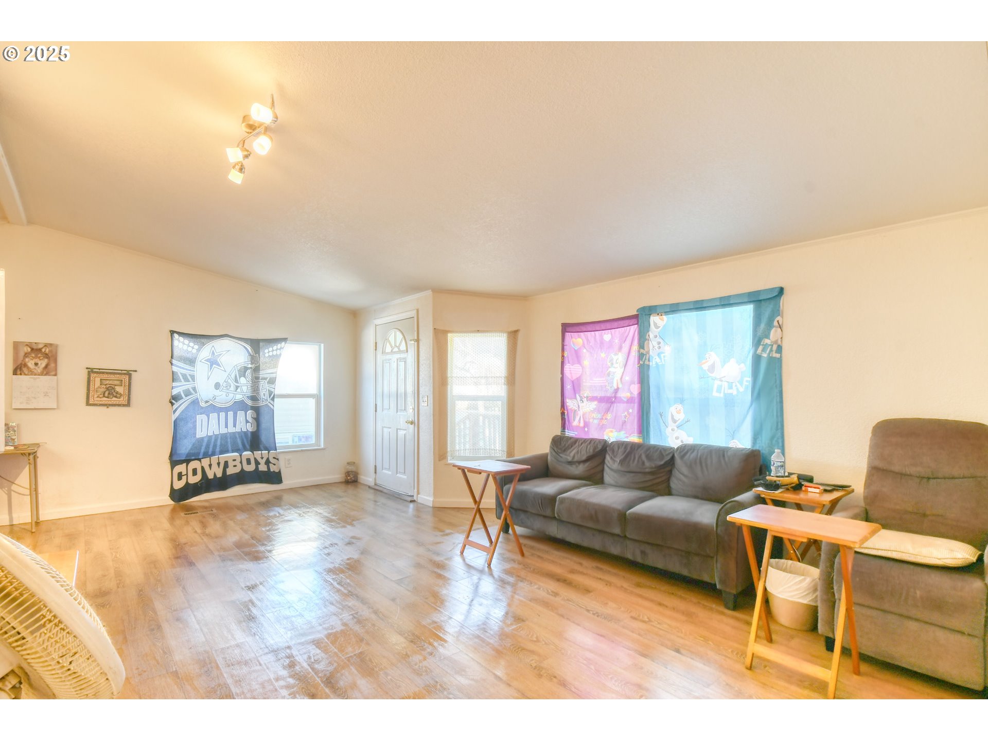 424 East High Street Athena, OR 97813 - Photo 8 of 40 a living room with furniture and a large window