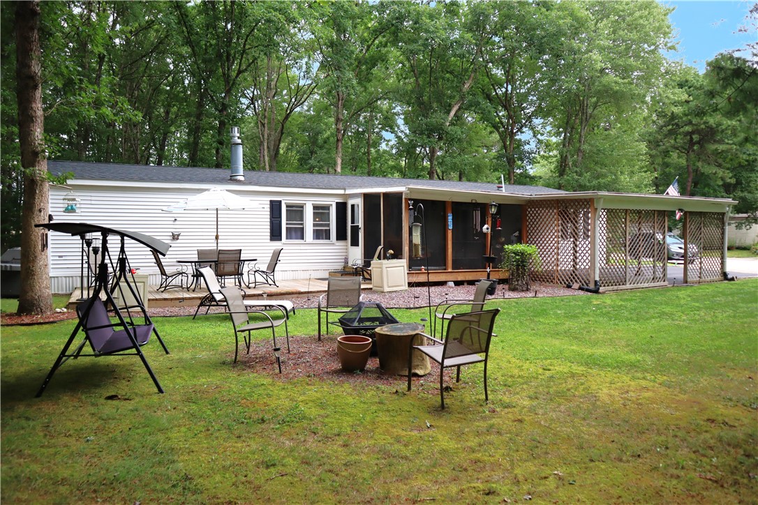 52 Leisure Way Coventry, RI 02816 - Photo 2 of 41 Left Side of Home with Deck
