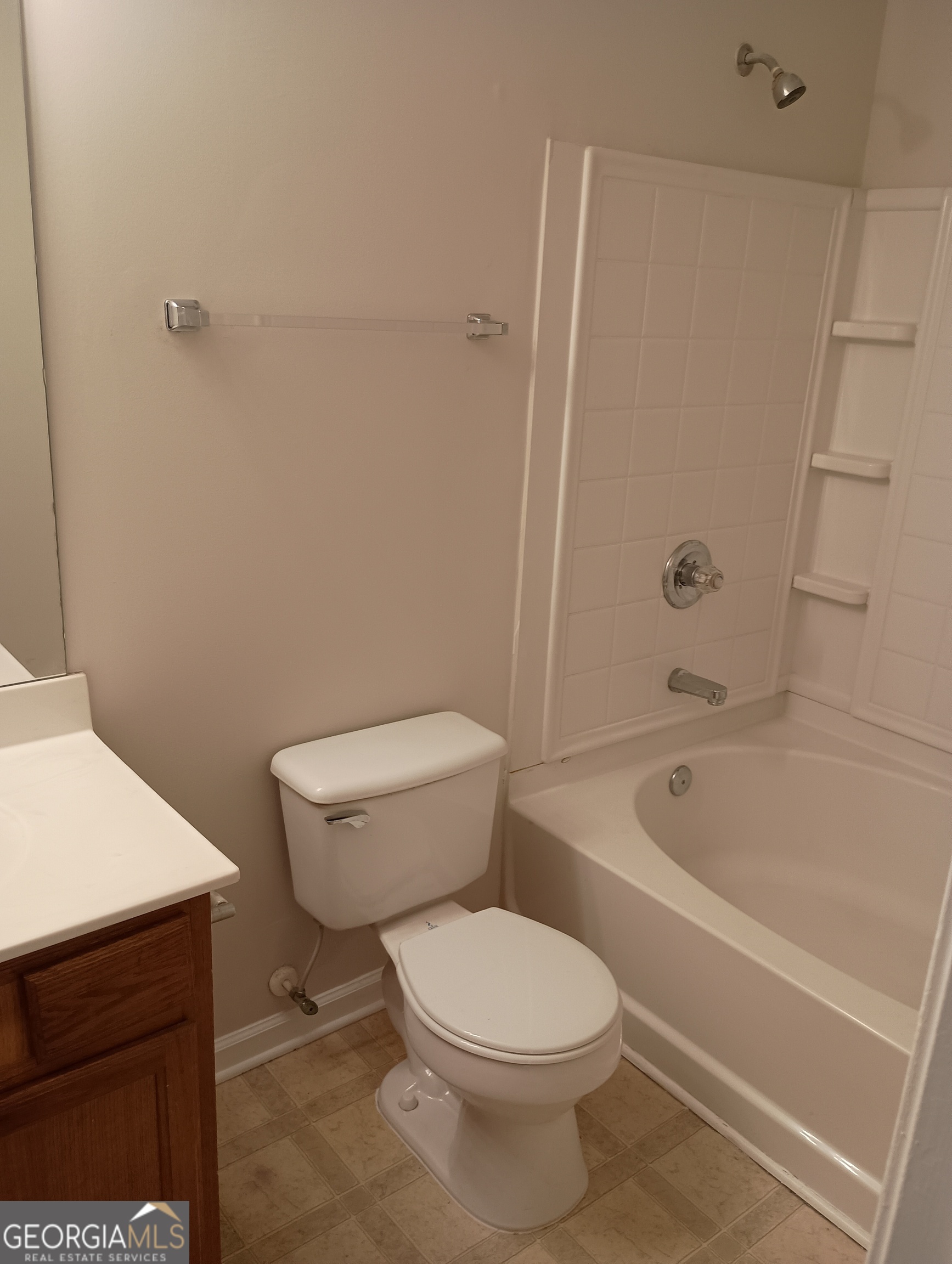 2941 Vining Ridge Terrace Decatur, GA 30034 - Photo 12 of 18 a white toilet sitting next to a bath tub