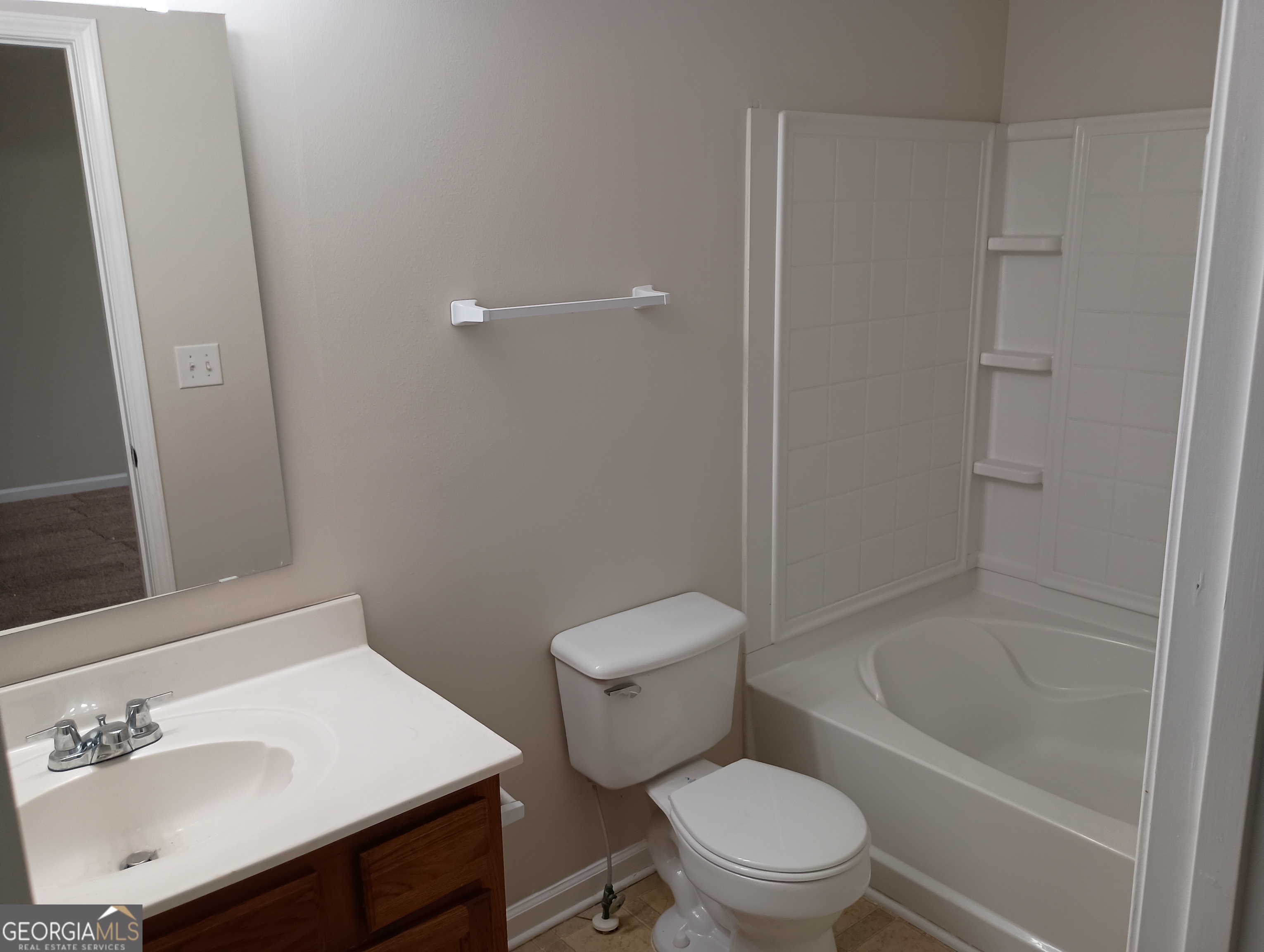 2941 Vining Ridge Terrace Decatur, GA 30034 - Photo 16 of 18 a white toilet sitting next to a bath tub
