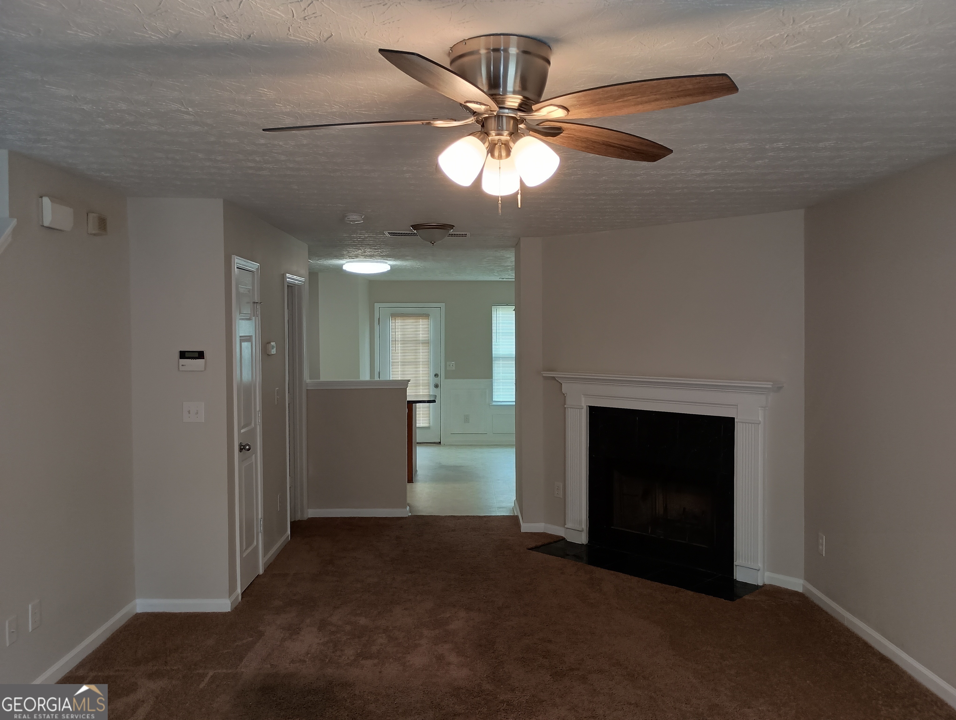 2941 Vining Ridge Terrace Decatur, GA 30034 - Photo 6 of 18 a view of a livingroom with a fireplace