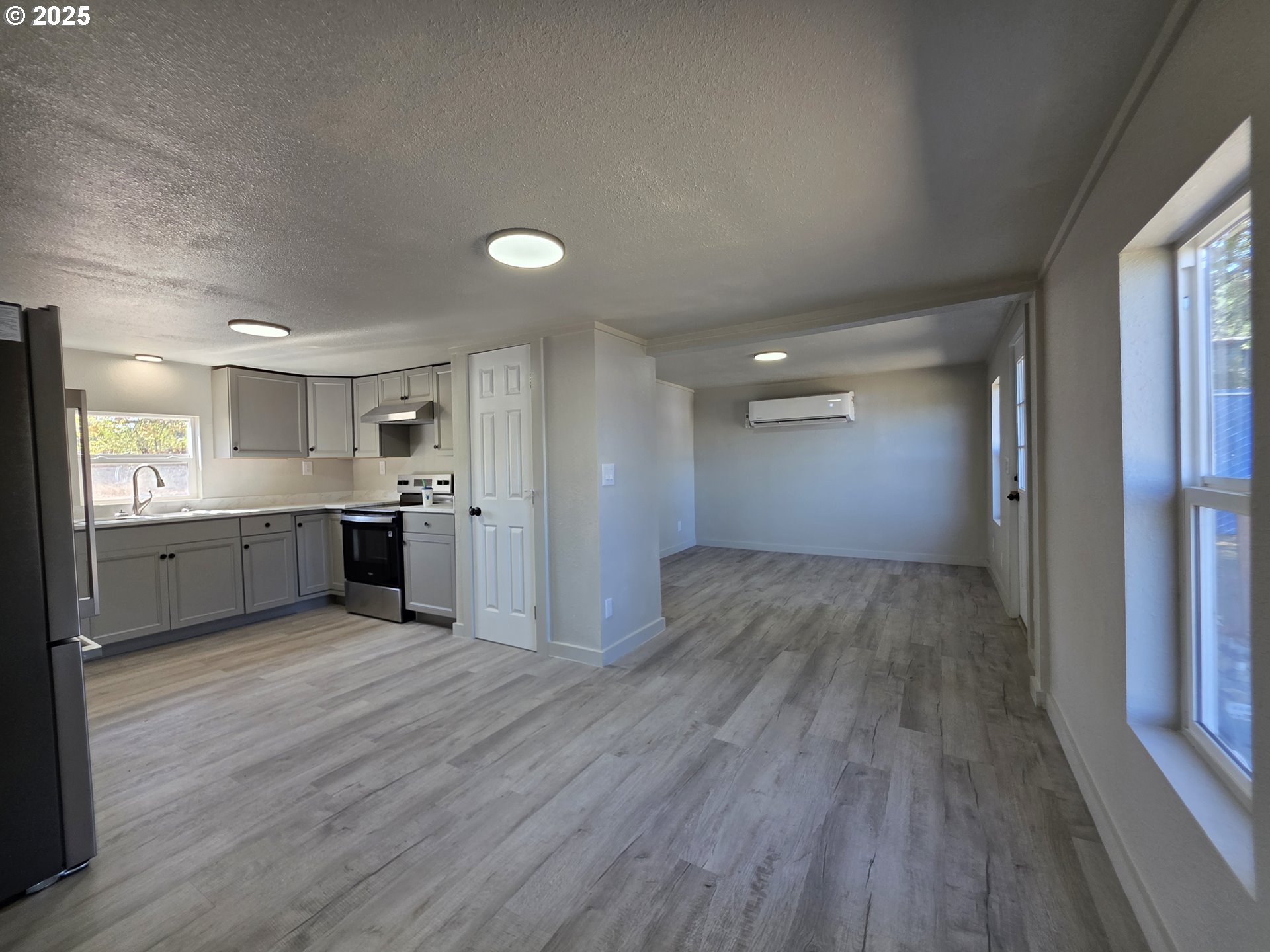 510 Boyer Road Riddle, OR 97469 - Photo 15 of 31 a view of a kitchen with a sink and wooden floor