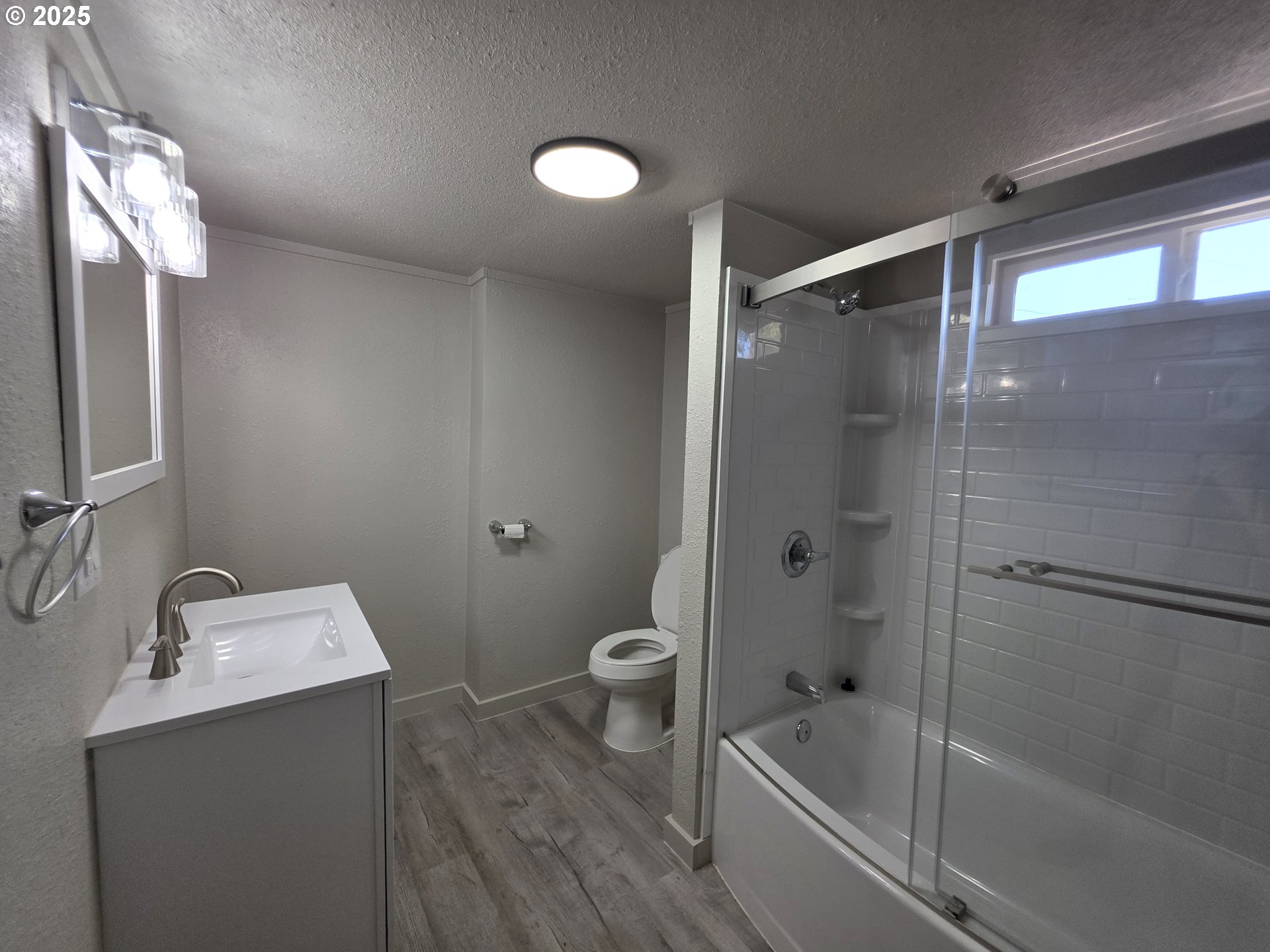 510 Boyer Road Riddle, OR 97469 - Photo 19 of 31 a bathroom with a bathtub shower sink vanity and toilet