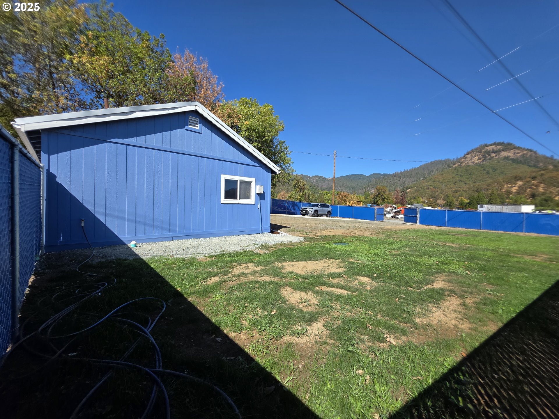 510 Boyer Road Riddle, OR 97469 - Photo 4 of 31 a view of a backyard with a garden
