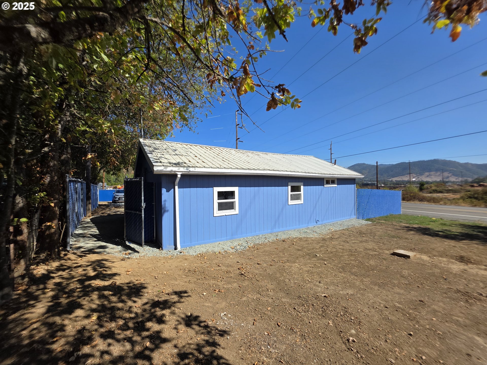510 Boyer Road Riddle, OR 97469 - Photo 6 of 31 a view of a backyard of the house