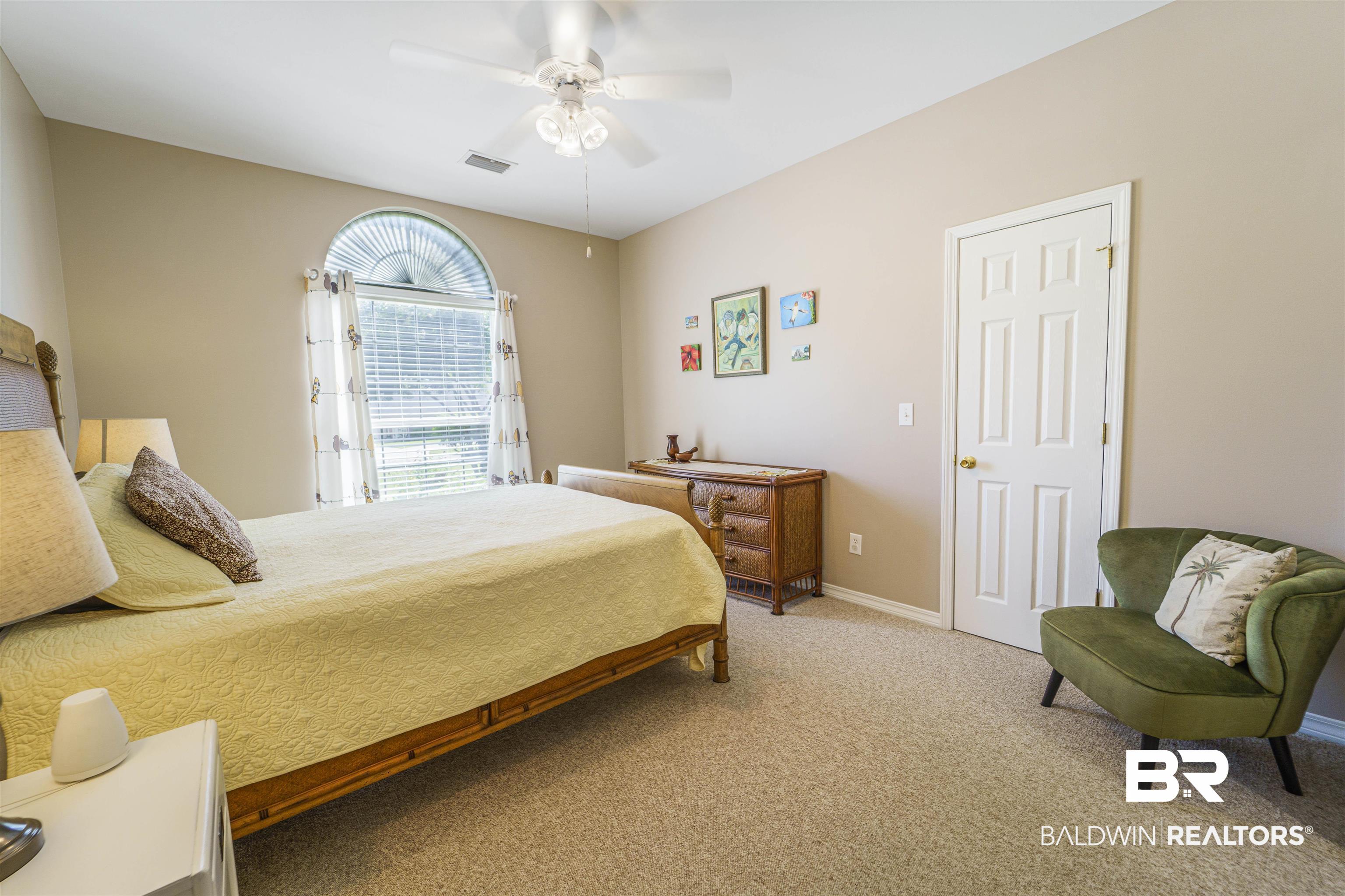 9505 Lakeview Drive Foley, AL 36535 - Photo 23 of 38 Bedroom featuring light carpet and ceiling fan