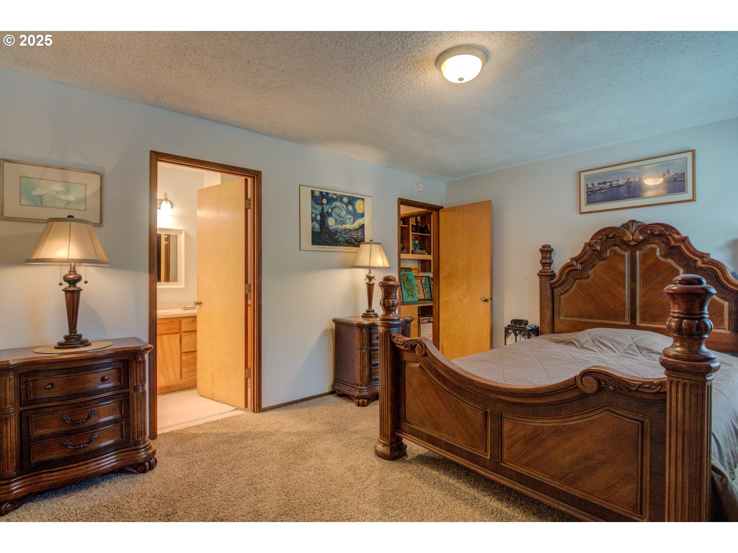 1620 26th Street Florence, OR 97439 - Photo 13 of 27 a bed room with a bed and a television
