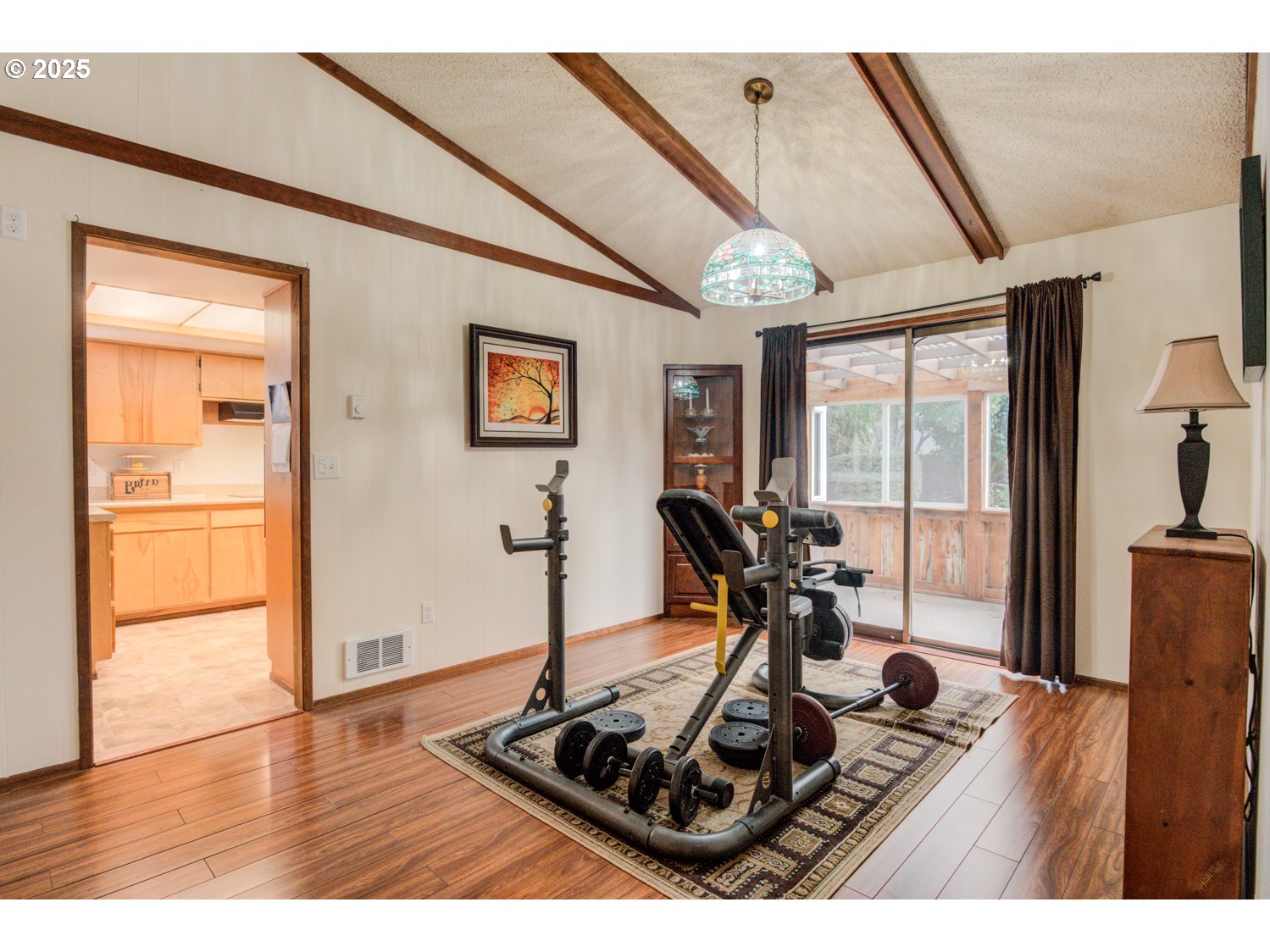 1620 26th Street Florence, OR 97439 - Photo 16 of 27 a room with furniture and large windows