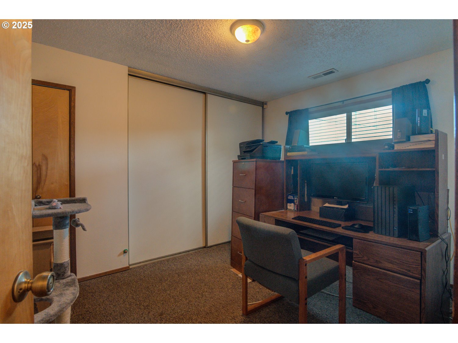 1620 26th Street Florence, OR 97439 - Photo 17 of 27 a kitchen with a sink and a refrigerator