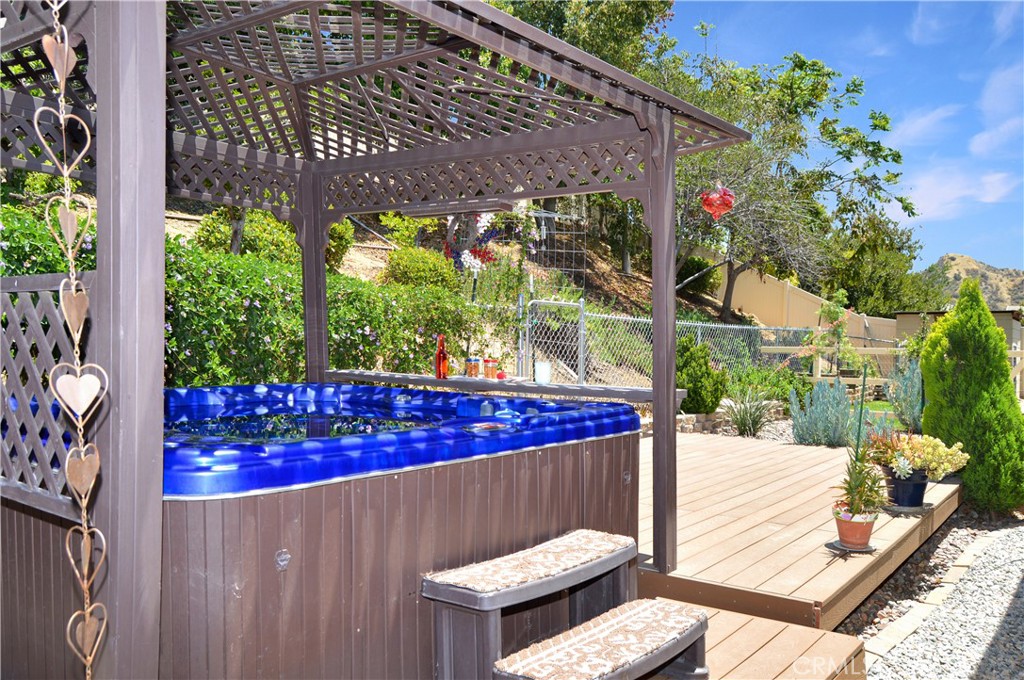166 Fox Lane Calimesa, CA 92320 - Photo 66 of 76 Sparkling Spa with a Bar to Enjoy Your Favorite Drinks and Snacks while You Relax Your Cares Away