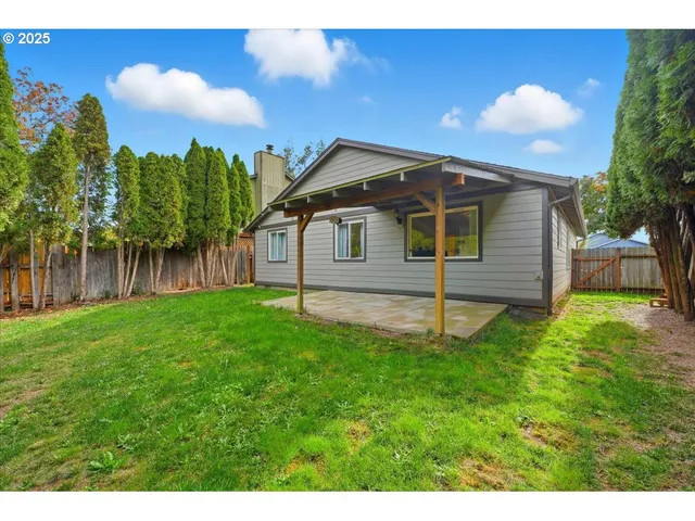 a bathroom with a sink and a yard