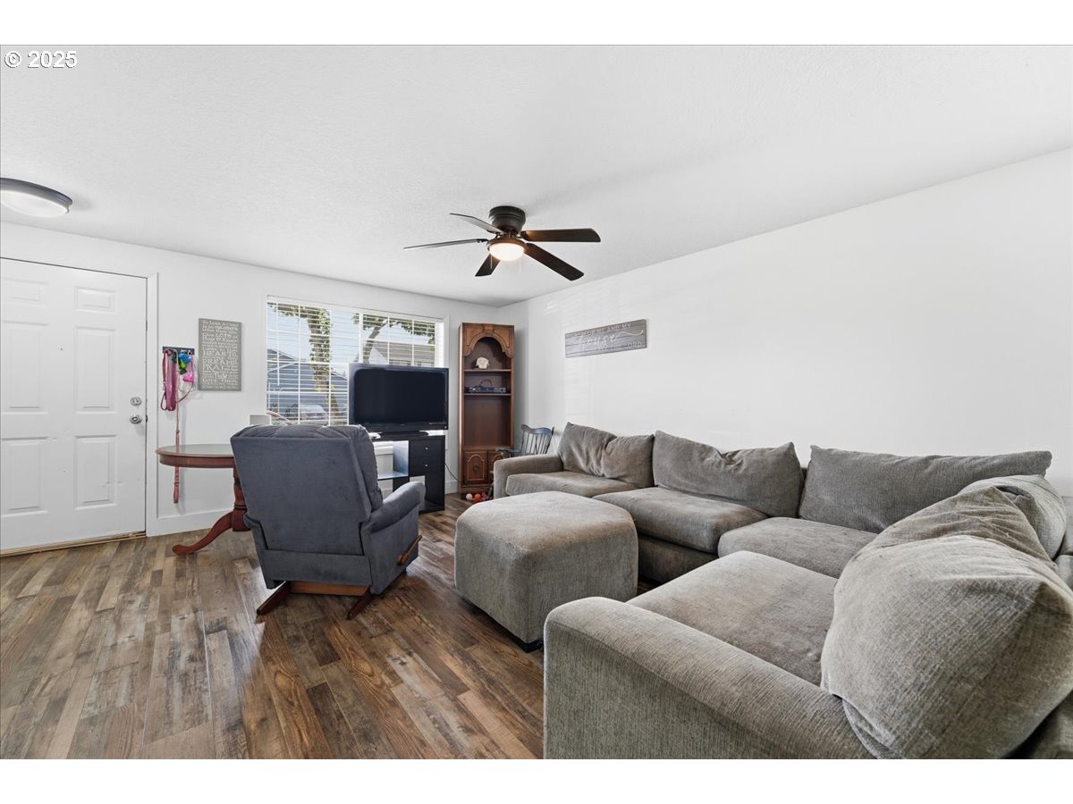 1802 Northwest 3rd Street Battle Ground, WA 98604 - Photo 6 of 16 a living room with furniture and a fireplace