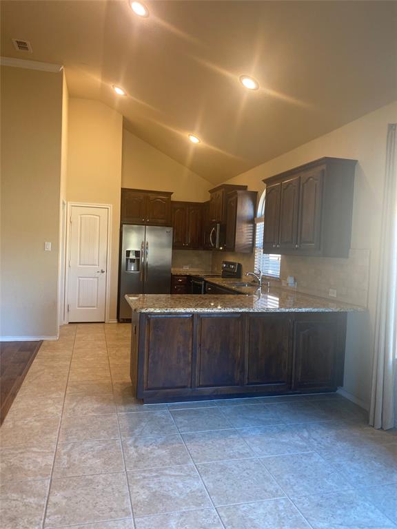 1220 Scott Drive Weatherford, TX 76087 - Photo 13 of 35 Pantry next to refrigerator for easy reach when preparing your next level chef creations.
