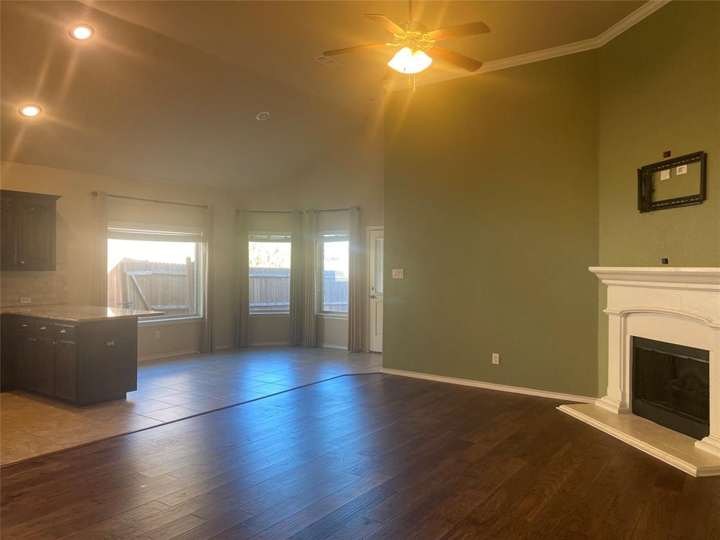 1220 Scott Drive Weatherford, TX 76087 - Photo 35 of 35 Open space floorplan with fireplace and wall mount above the fireplace for your TV.