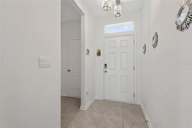 a view of an entryway with bathroom