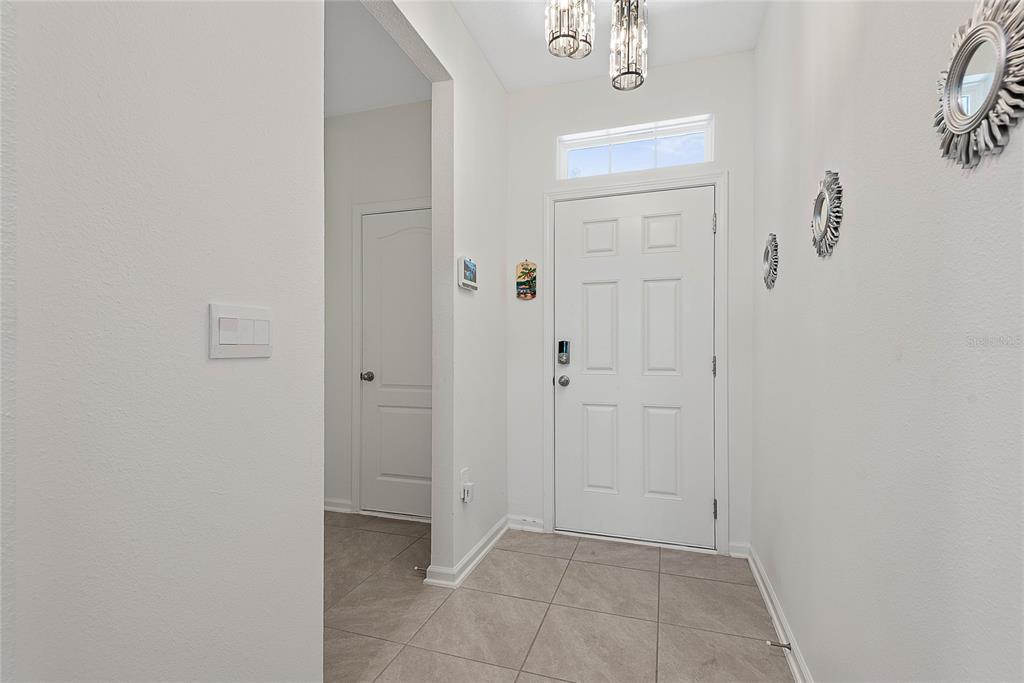 309 Redbud Road Palm Coast, FL 32137 - Photo 8 of 33 a view of an entryway with bathroom