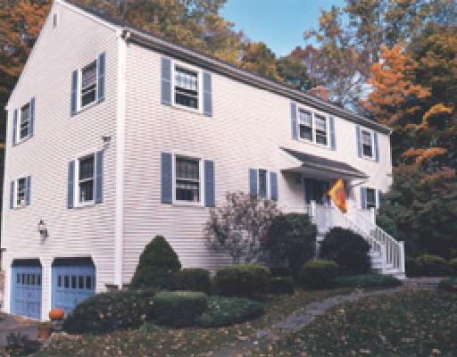 60 Nursery Road Ridgefield, CT 06877 - Photo 1 of 1 a front view of a house with a yard