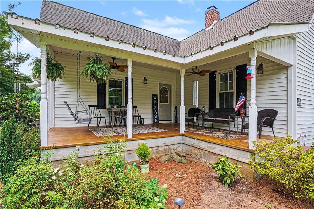355 Inman Road Hampton, GA 30228 - Photo 3 of 47 front view of a house with a porch