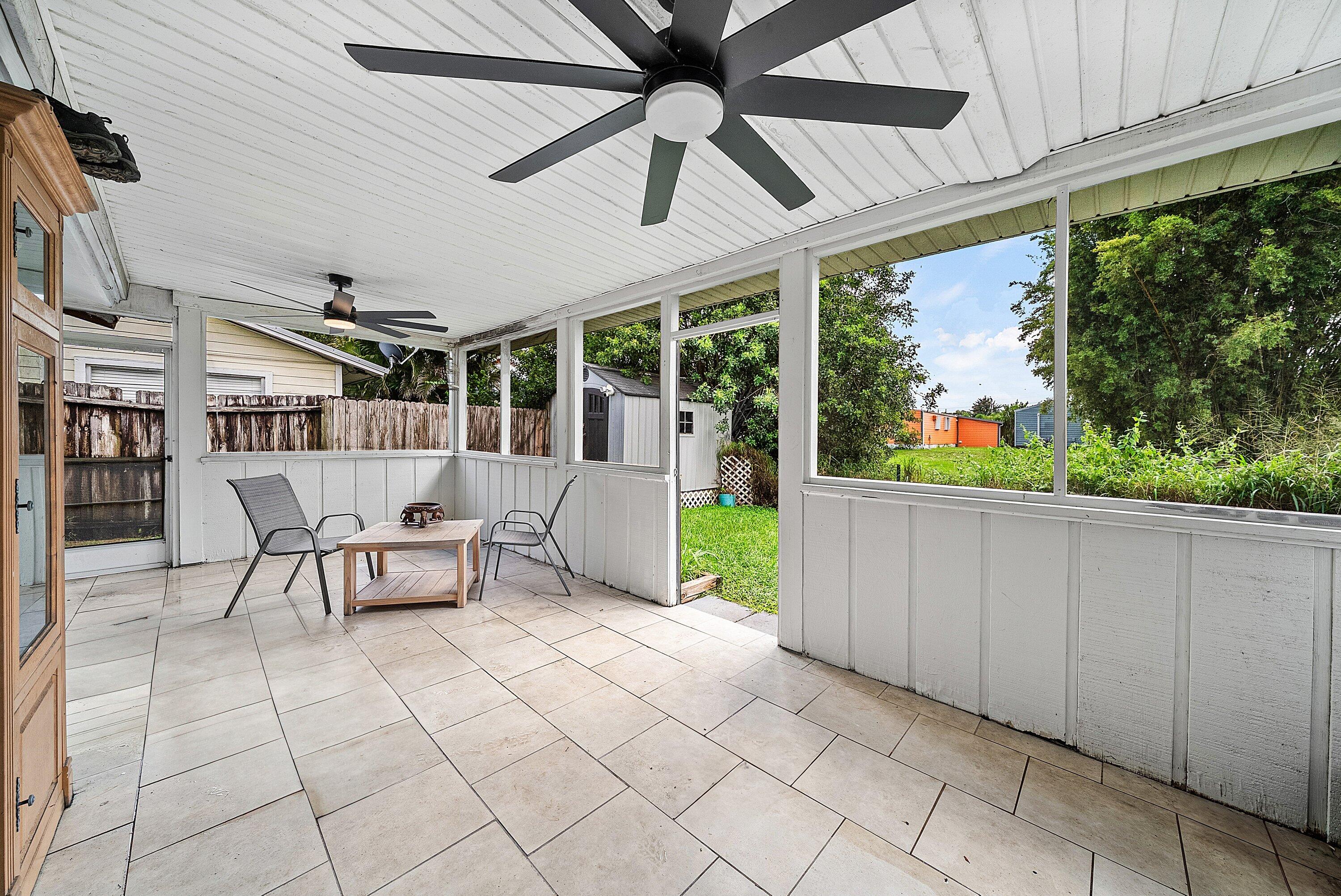 4500 Southeast Salvatori Road Stuart, FL 34997 - Photo 20 of 25 a outdoor space with the couches and dining table chair
