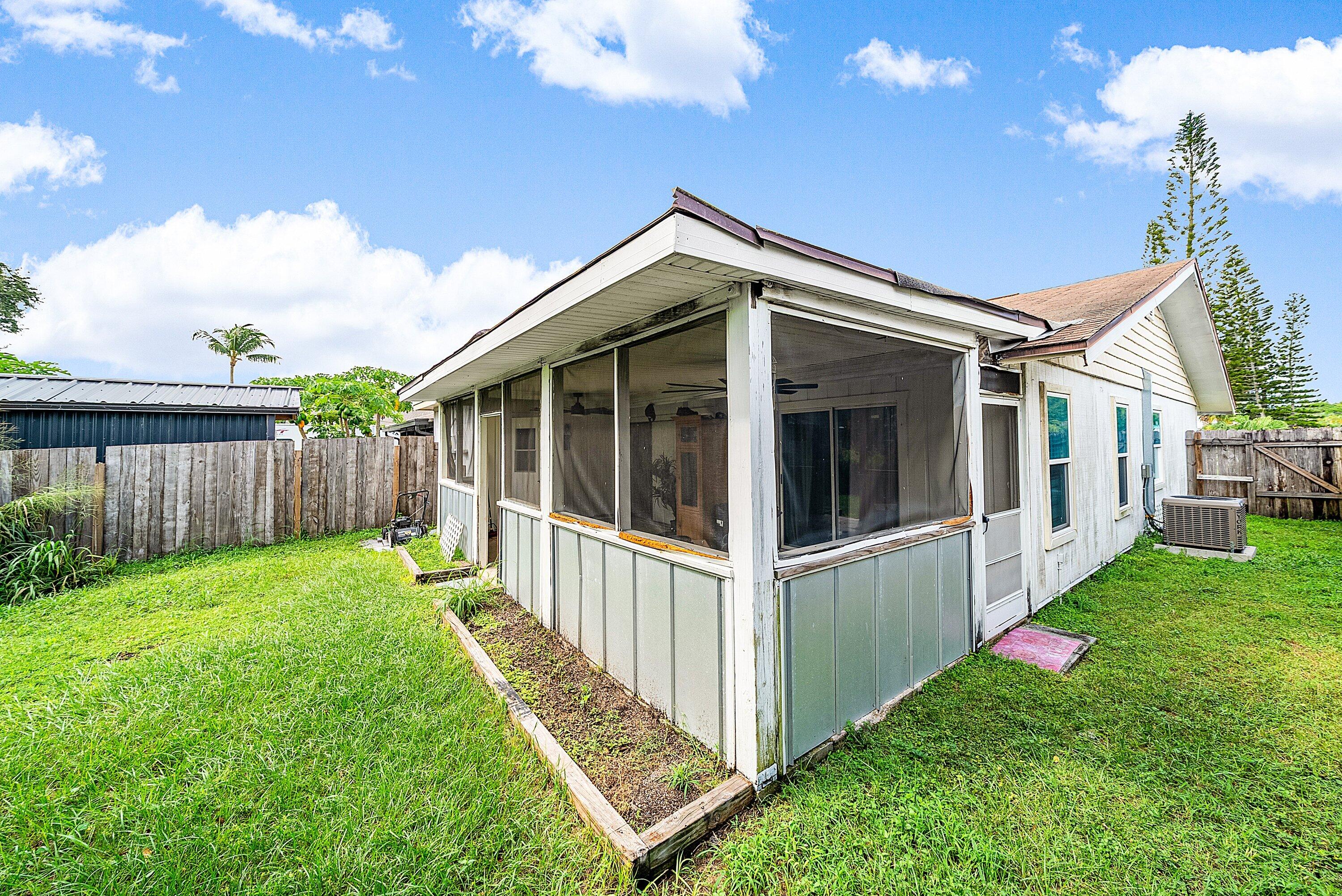 4500 Southeast Salvatori Road Stuart, FL 34997 - Photo 24 of 25 a view of a house with backyard