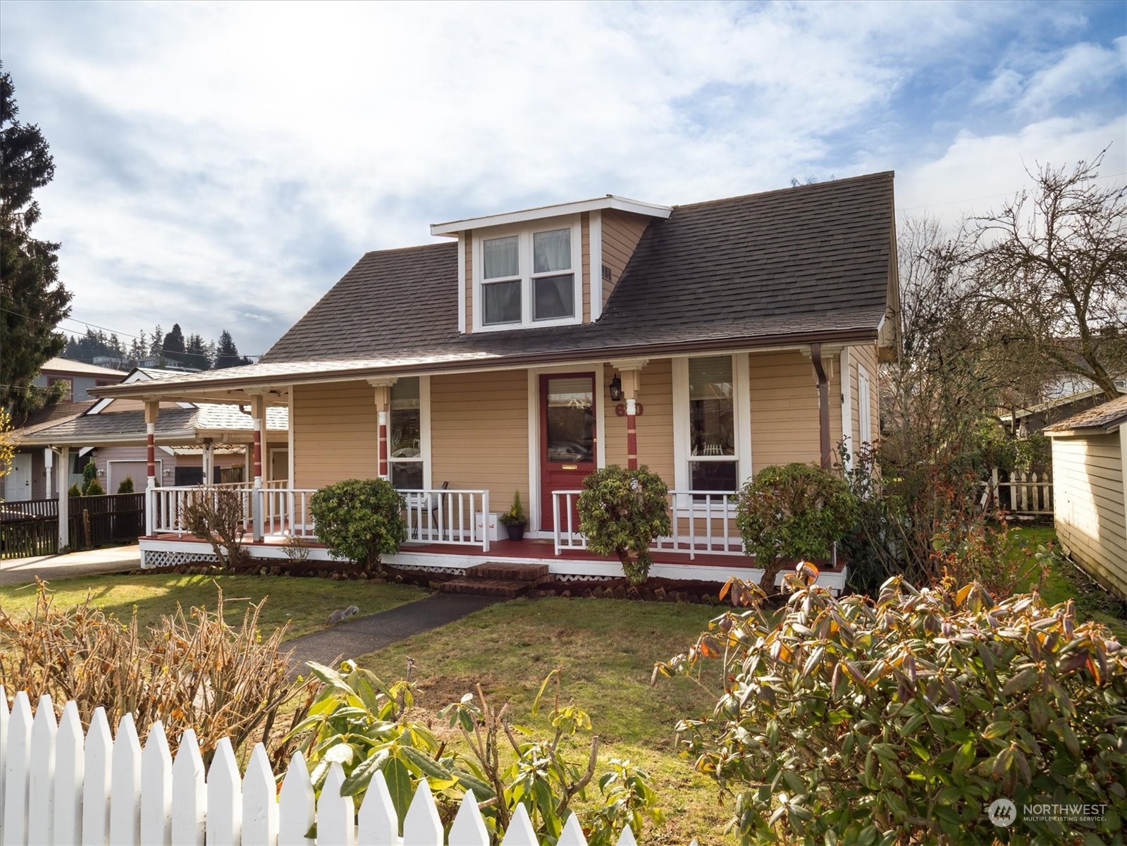 610 Maple Street Edmonds, WA 98020 - Photo 1 of 36 a front view of house with swimming pool and porch