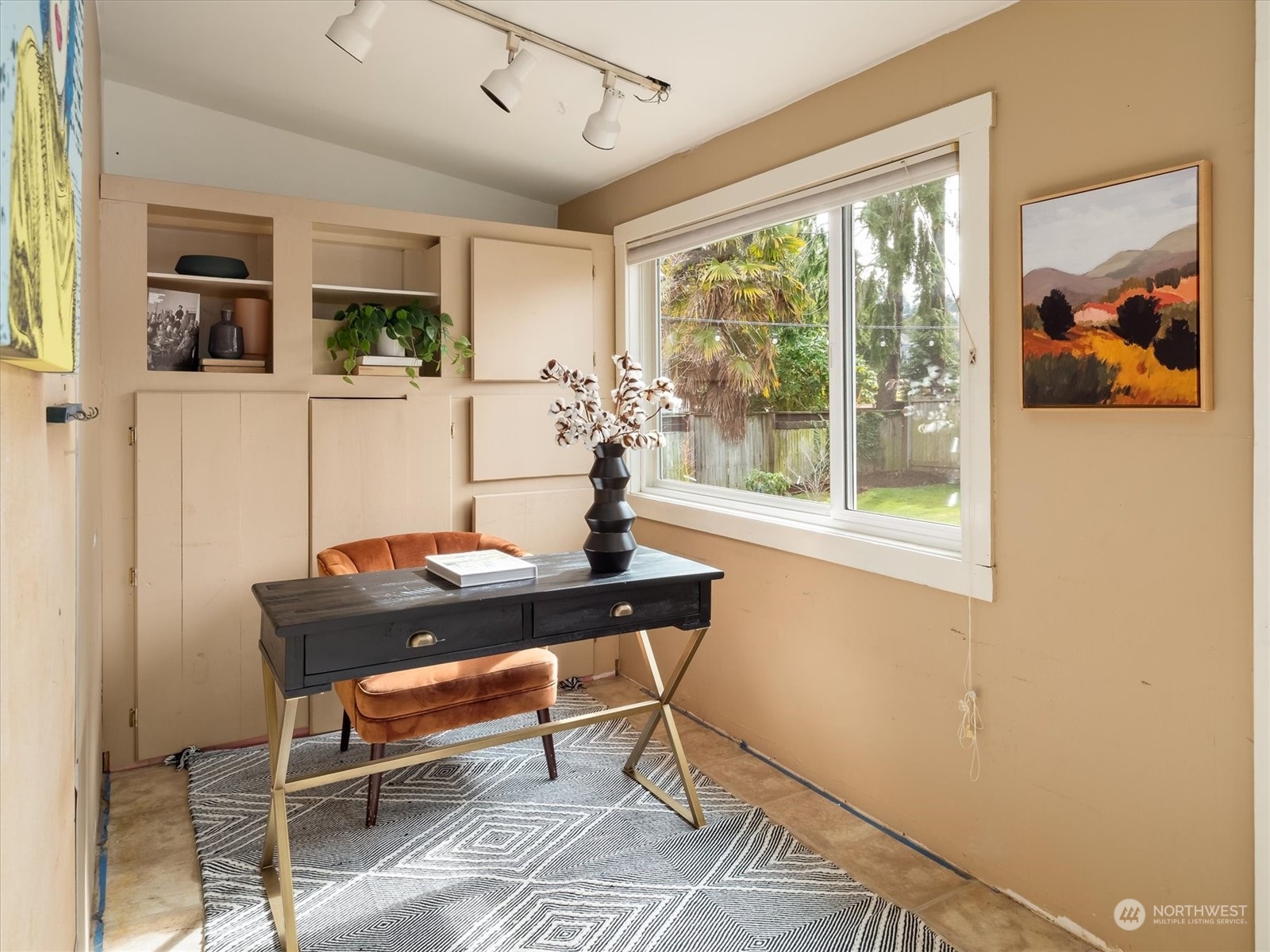 610 Maple Street Edmonds, WA 98020 - Photo 20 of 36 a view of a workspace with furniture and a window