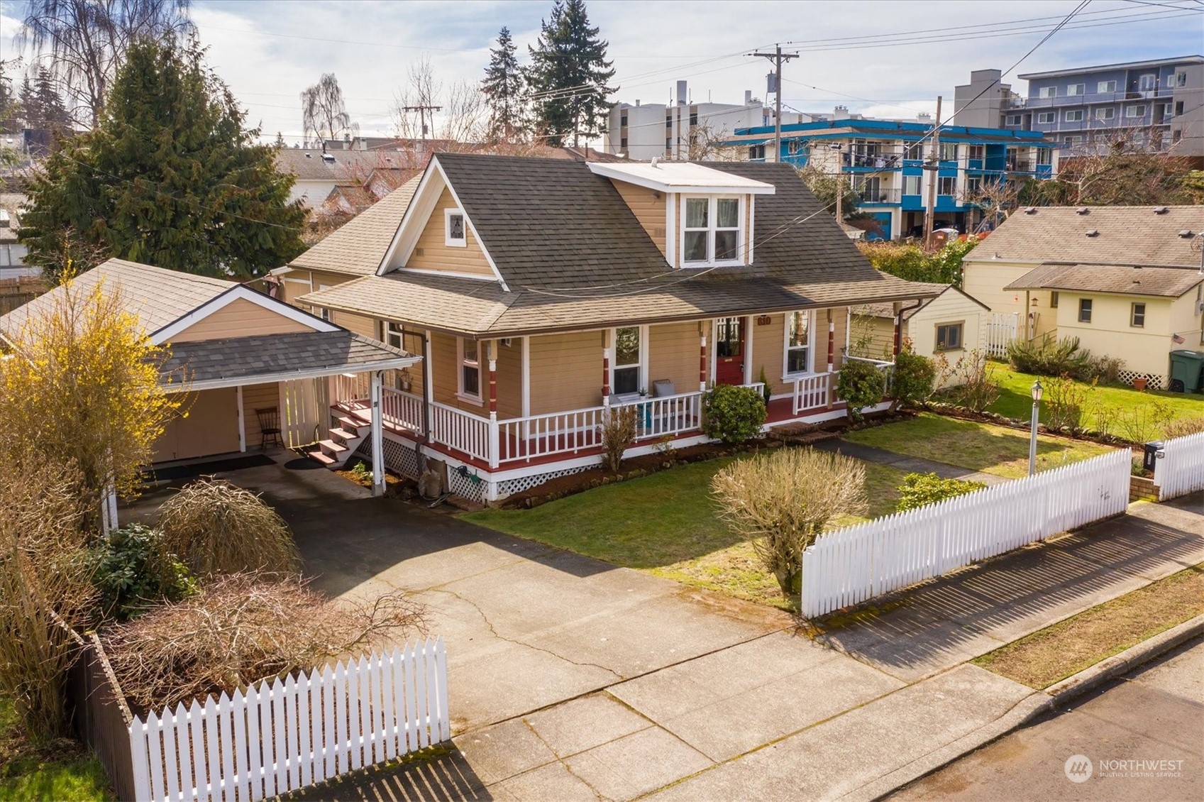 610 Maple Street Edmonds, WA 98020 - Photo 2 of 36 a view of a house with pool and chairs