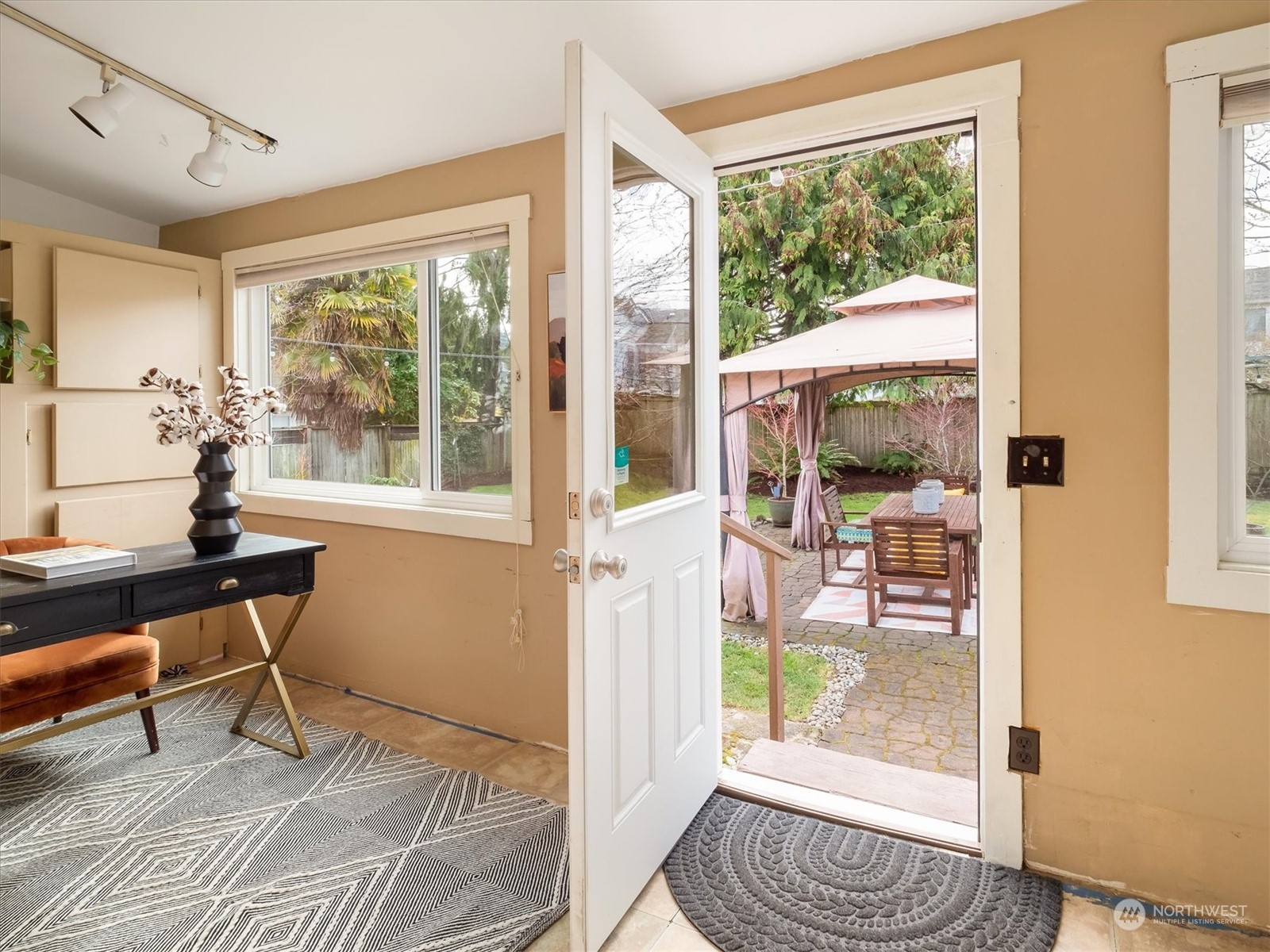 610 Maple Street Edmonds, WA 98020 - Photo 22 of 36 a living room with furniture and a window