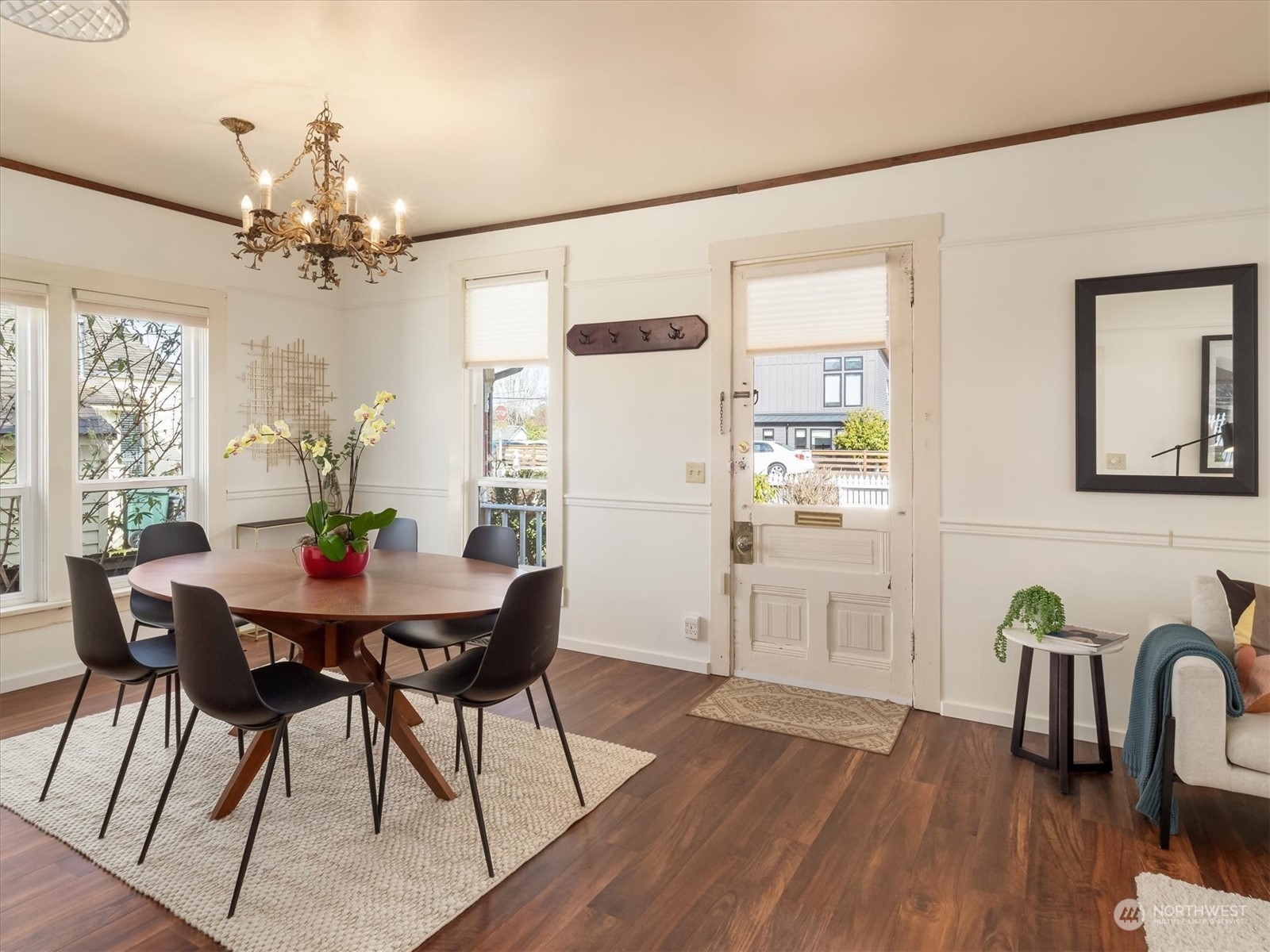 610 Maple Street Edmonds, WA 98020 - Photo 10 of 36 a view of a dining room with furniture window and wooden floor