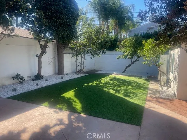 a view of a back yard of the house