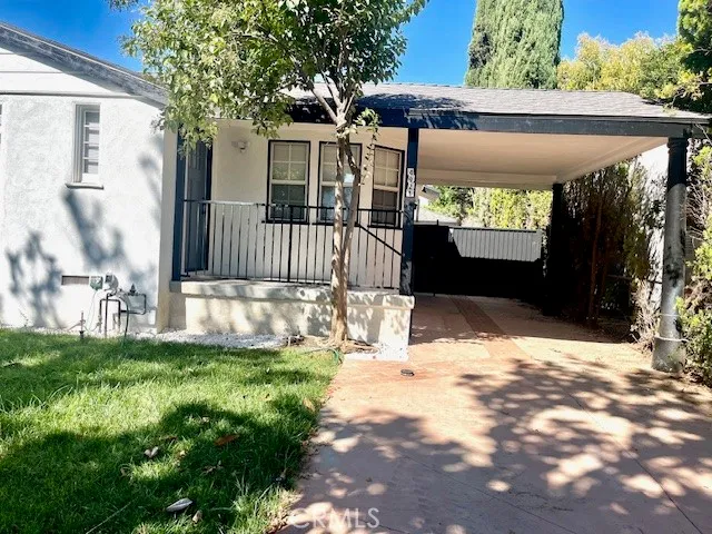 a view of a house with a porch