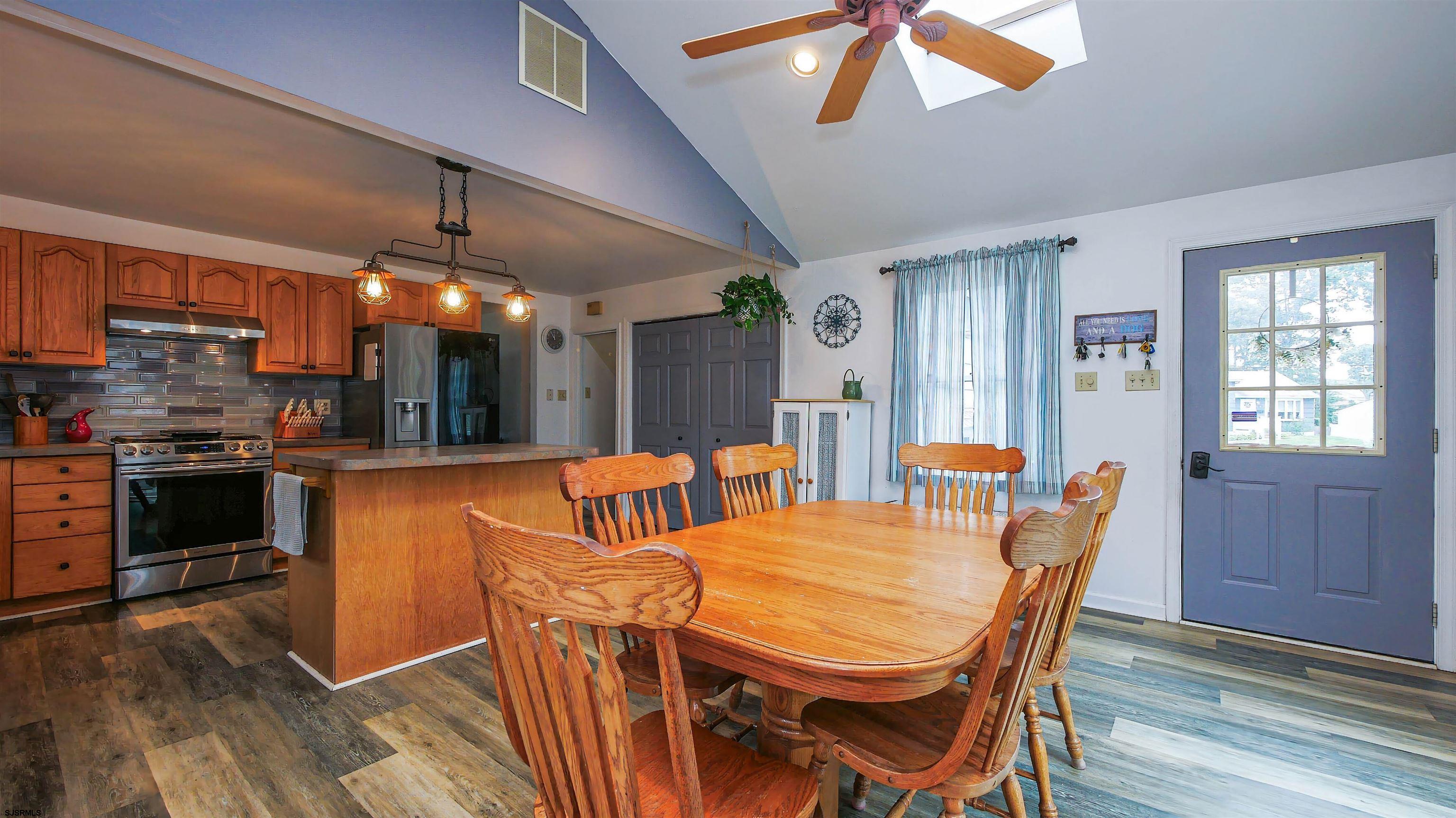 2 Rose Lane Somers Point, NJ 08244 - Photo 13 of 43 a view of a dining room with furniture window and wooden floor
