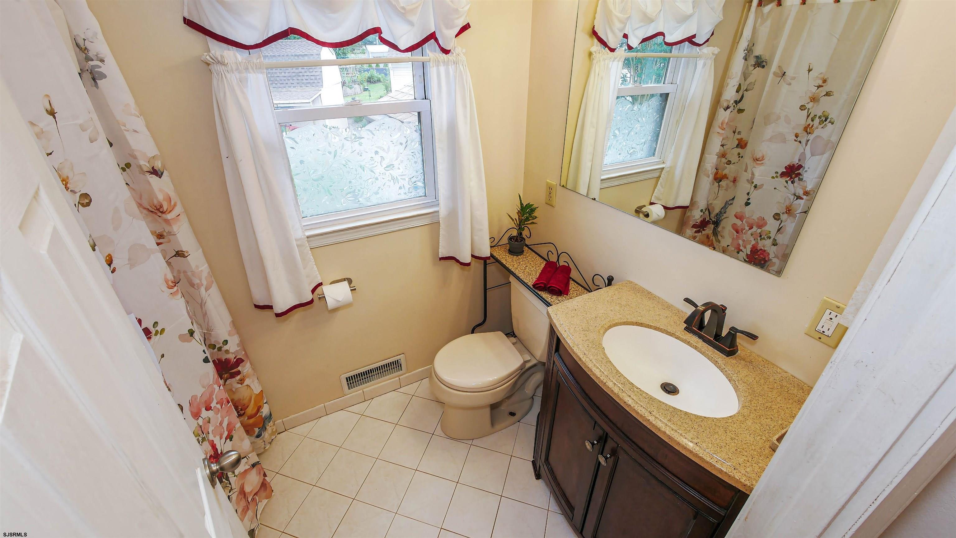 2 Rose Lane Somers Point, NJ 08244 - Photo 15 of 43 a bathroom with a sink toilet and shower