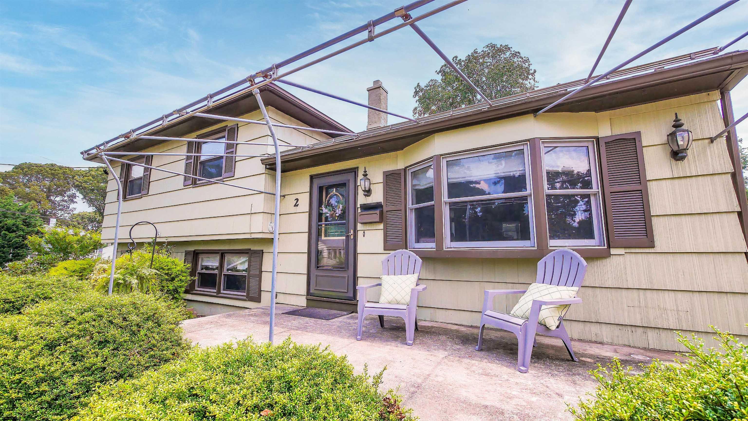 2 Rose Lane Somers Point, NJ 08244 - Photo 2 of 43 a view of house with a yard and sitting area