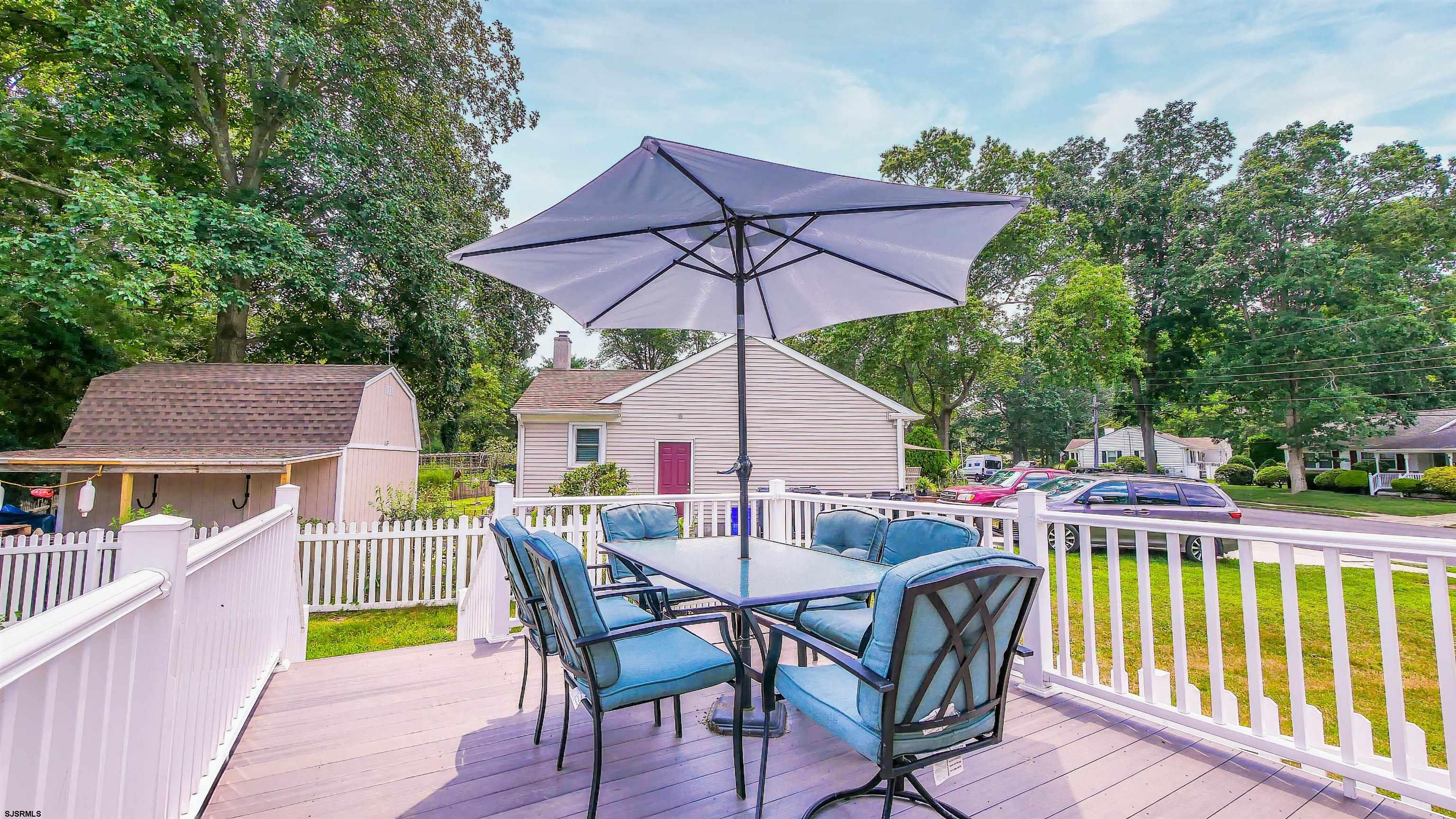 2 Rose Lane Somers Point, NJ 08244 - Photo 29 of 43 a view of a chair and table on the deck