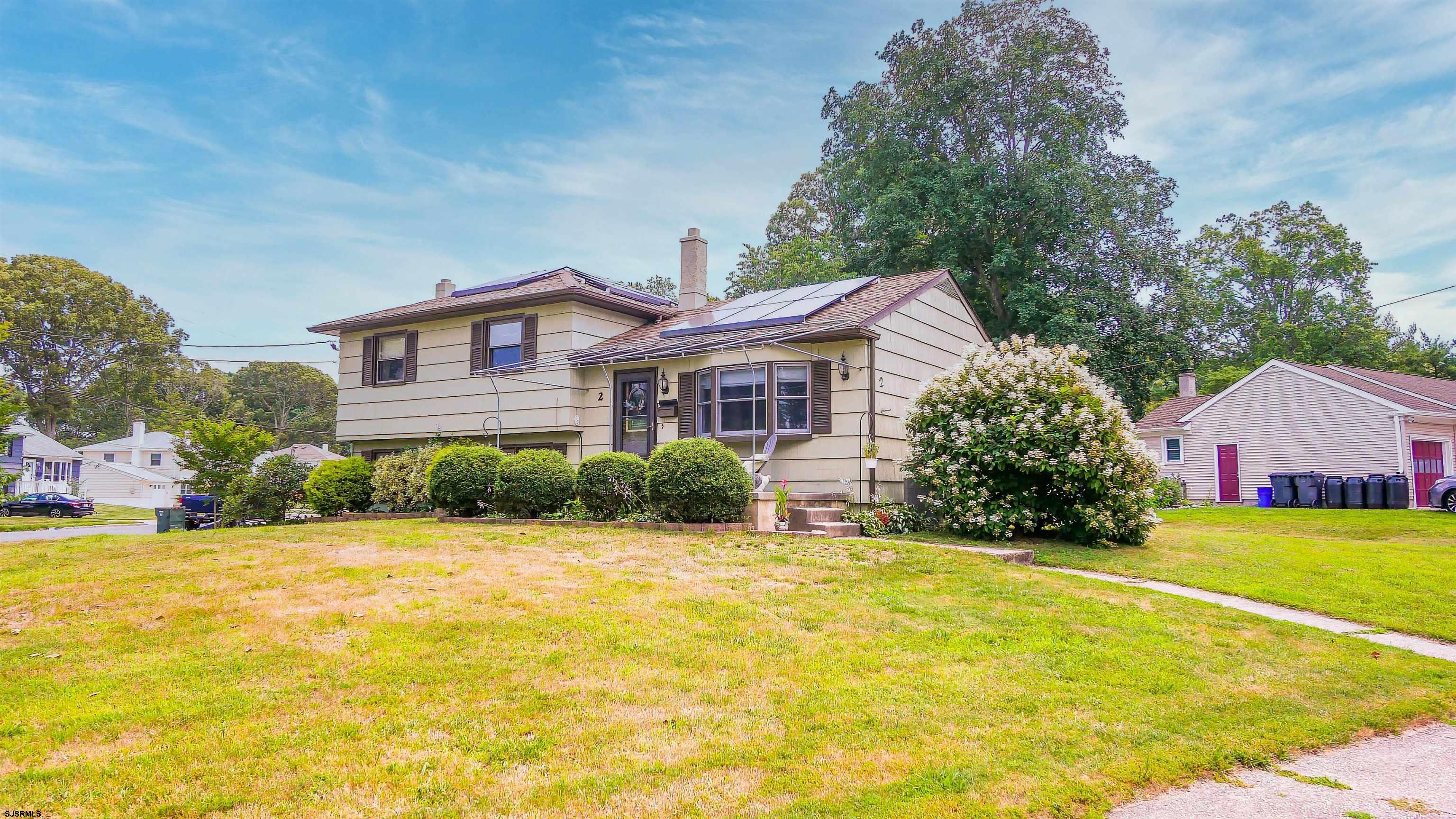 2 Rose Lane Somers Point, NJ 08244 - Photo 36 of 43 a front view of house with yard and green space