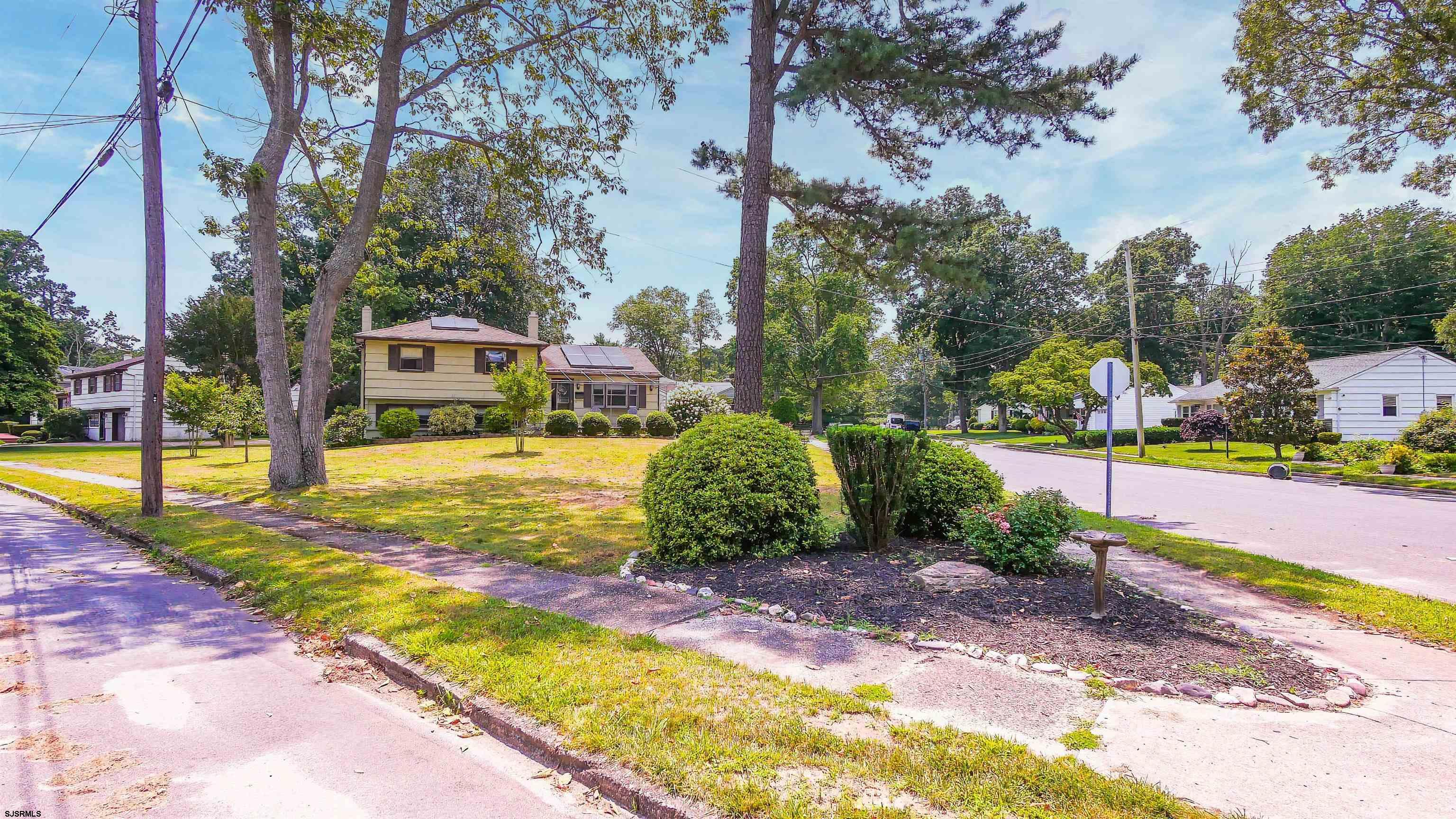 2 Rose Lane Somers Point, NJ 08244 - Photo 39 of 43 a view of yard with swimming pool and large trees