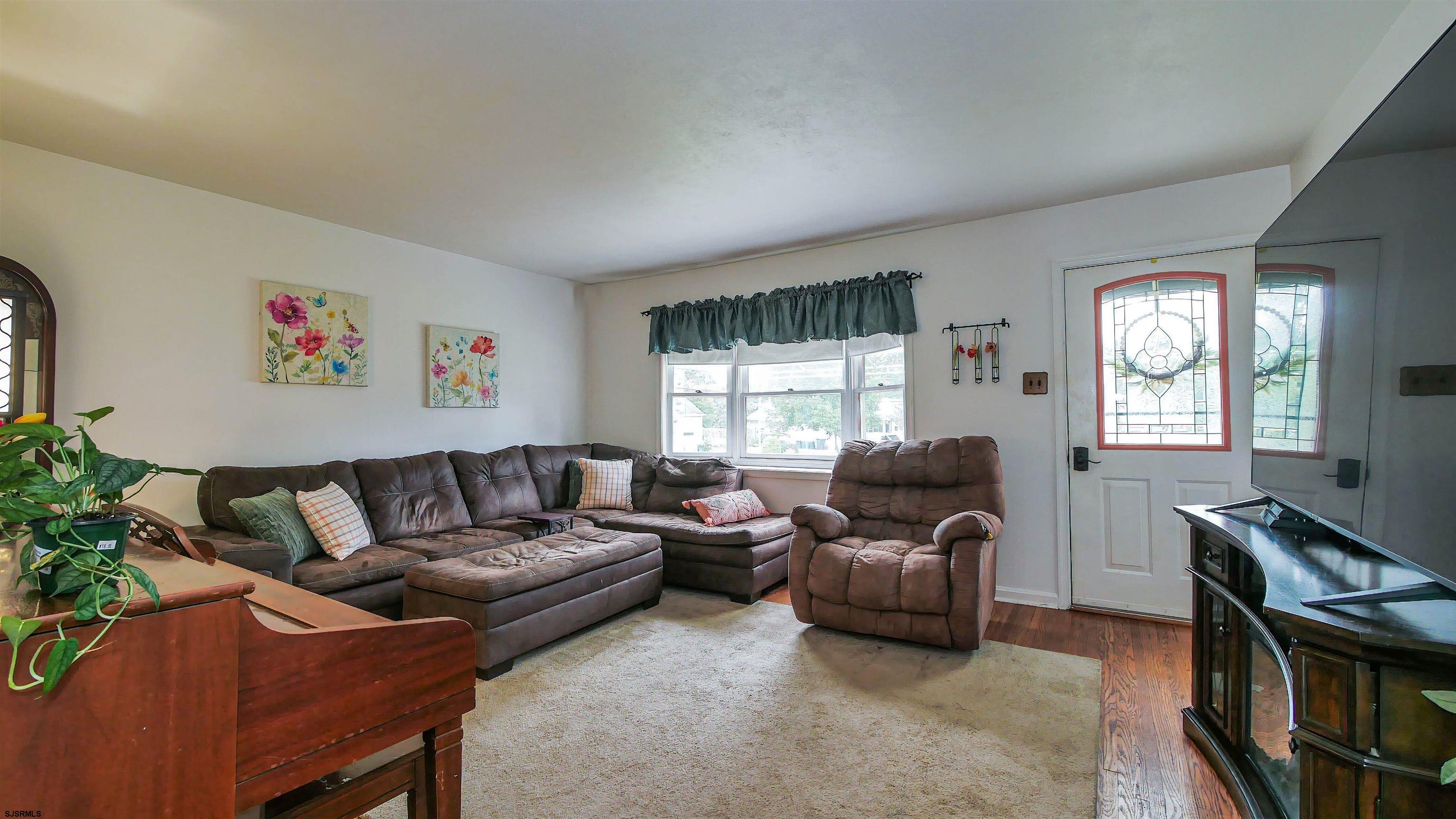 2 Rose Lane Somers Point, NJ 08244 - Photo 5 of 43 a living room with furniture and a window
