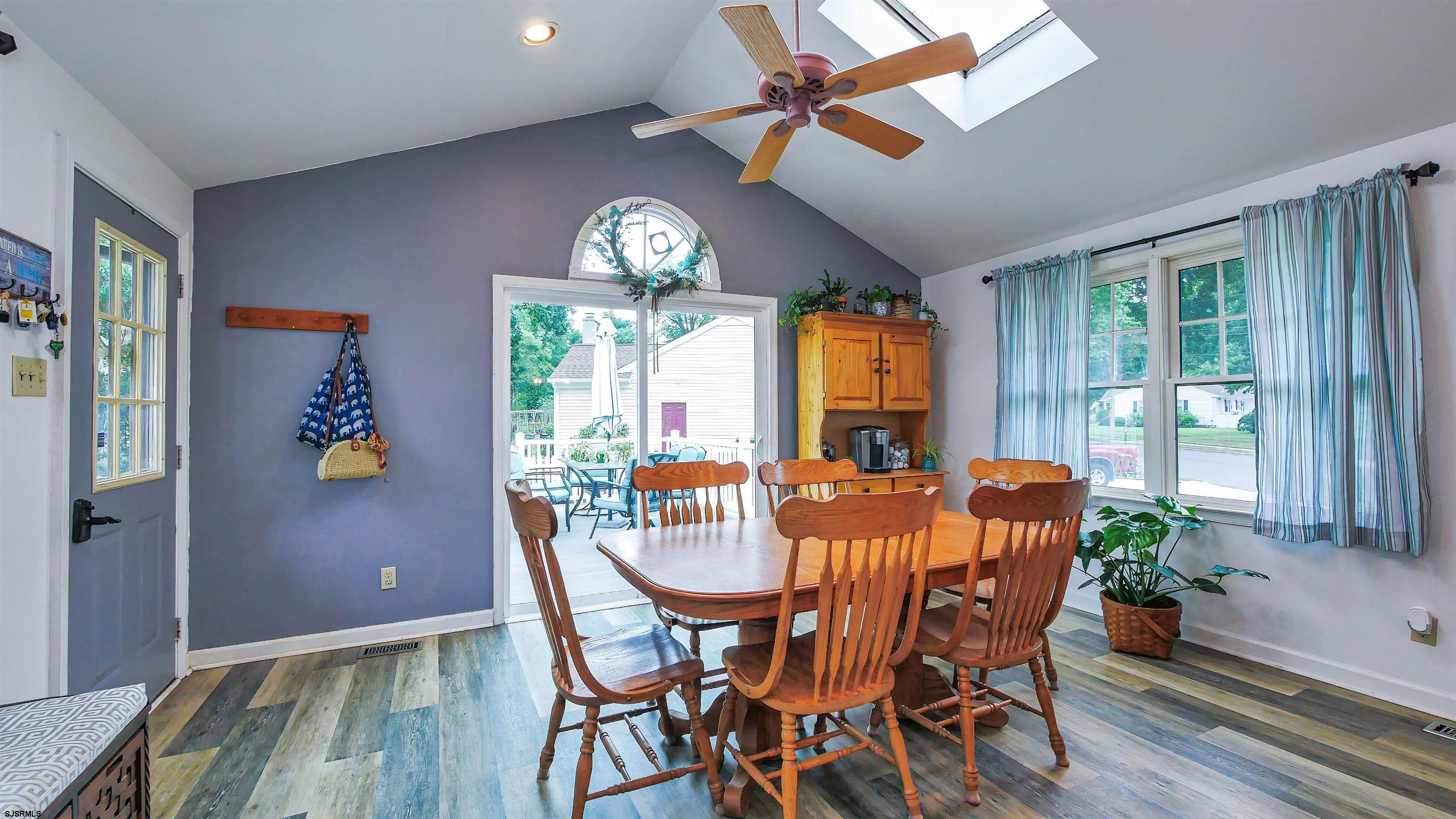 2 Rose Lane Somers Point, NJ 08244 - Photo 10 of 43 a view of a dining room with furniture window and wooden floor