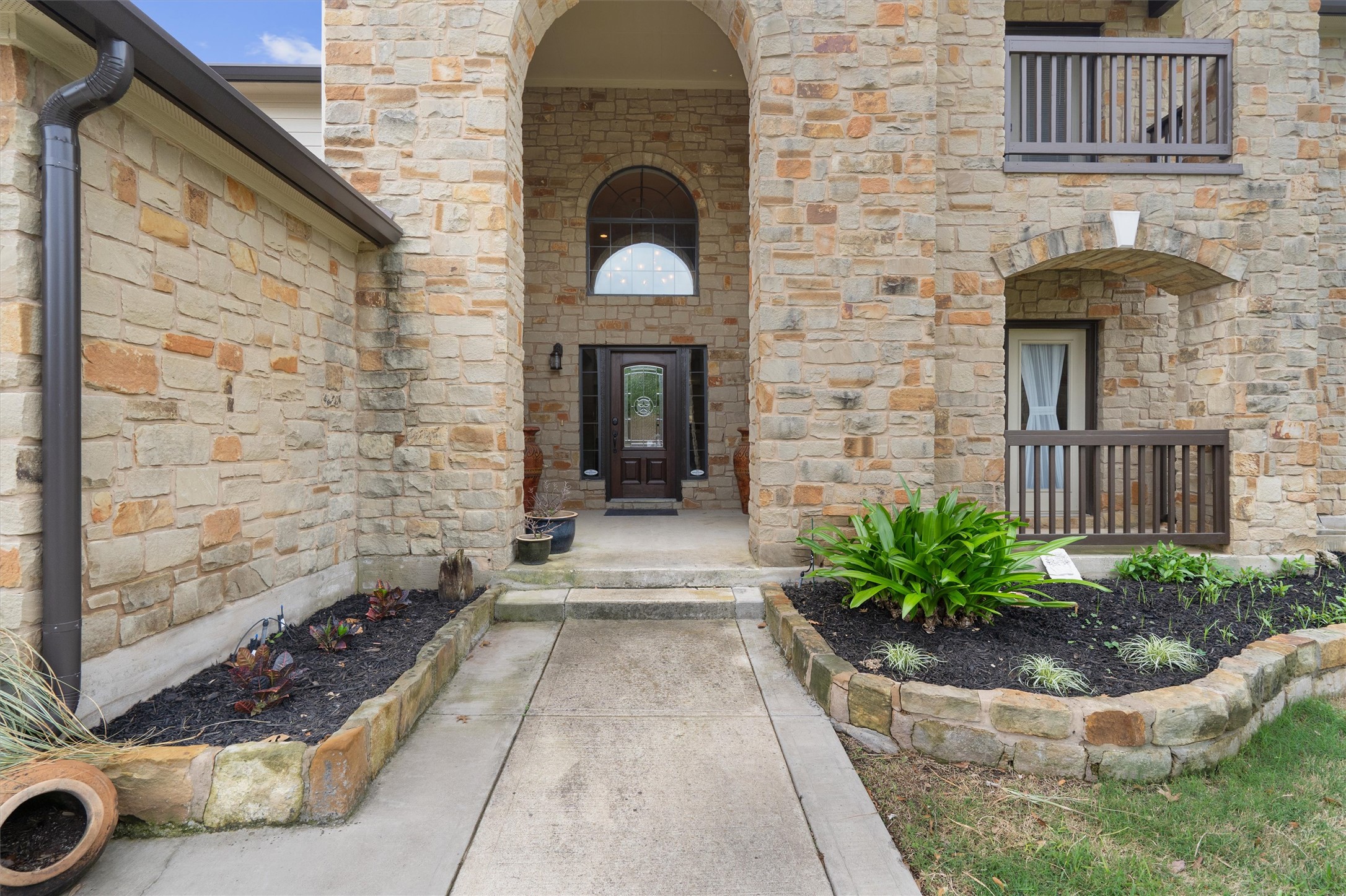 101 Breakaway Road Cedar Park, TX 78613 - Photo 2 of 37 Property entrance featuring stone siding