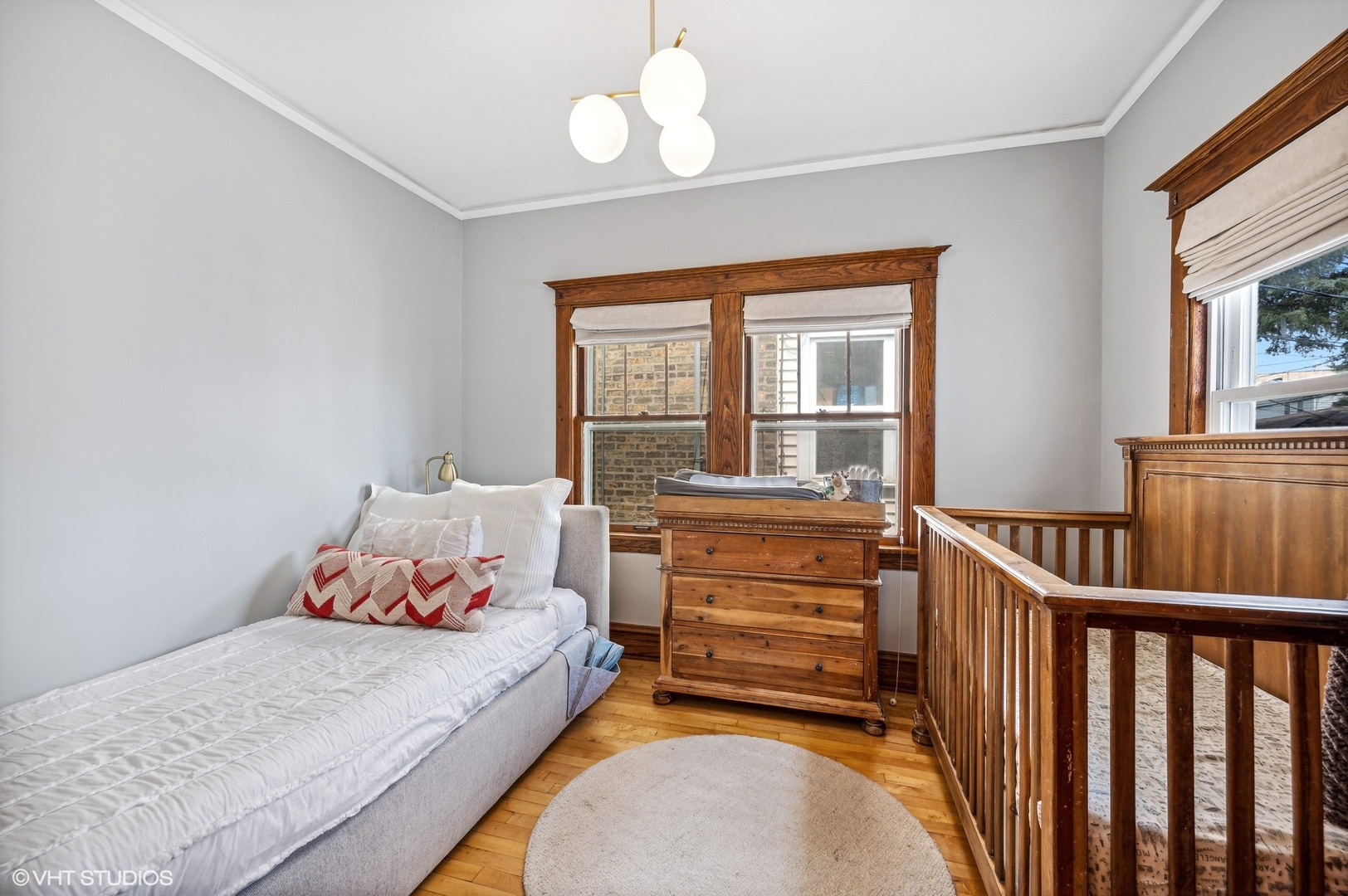 3125 North Springfield Avenue Chicago, IL 60618 - Photo 11 of 22 a bedroom with bed and a large window