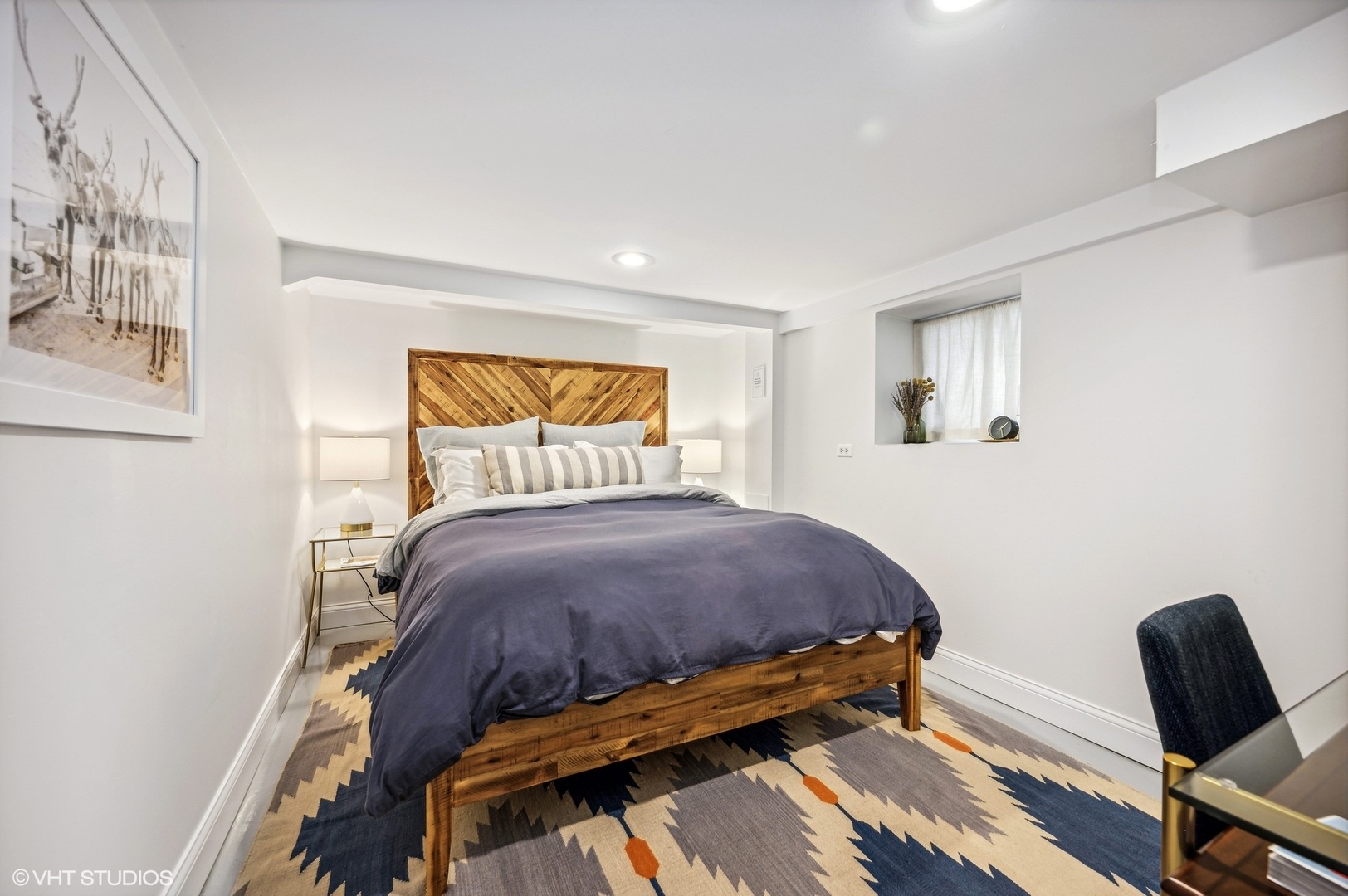 3125 North Springfield Avenue Chicago, IL 60618 - Photo 15 of 22 a bedroom with a bed a chair and potted plant on the dresser