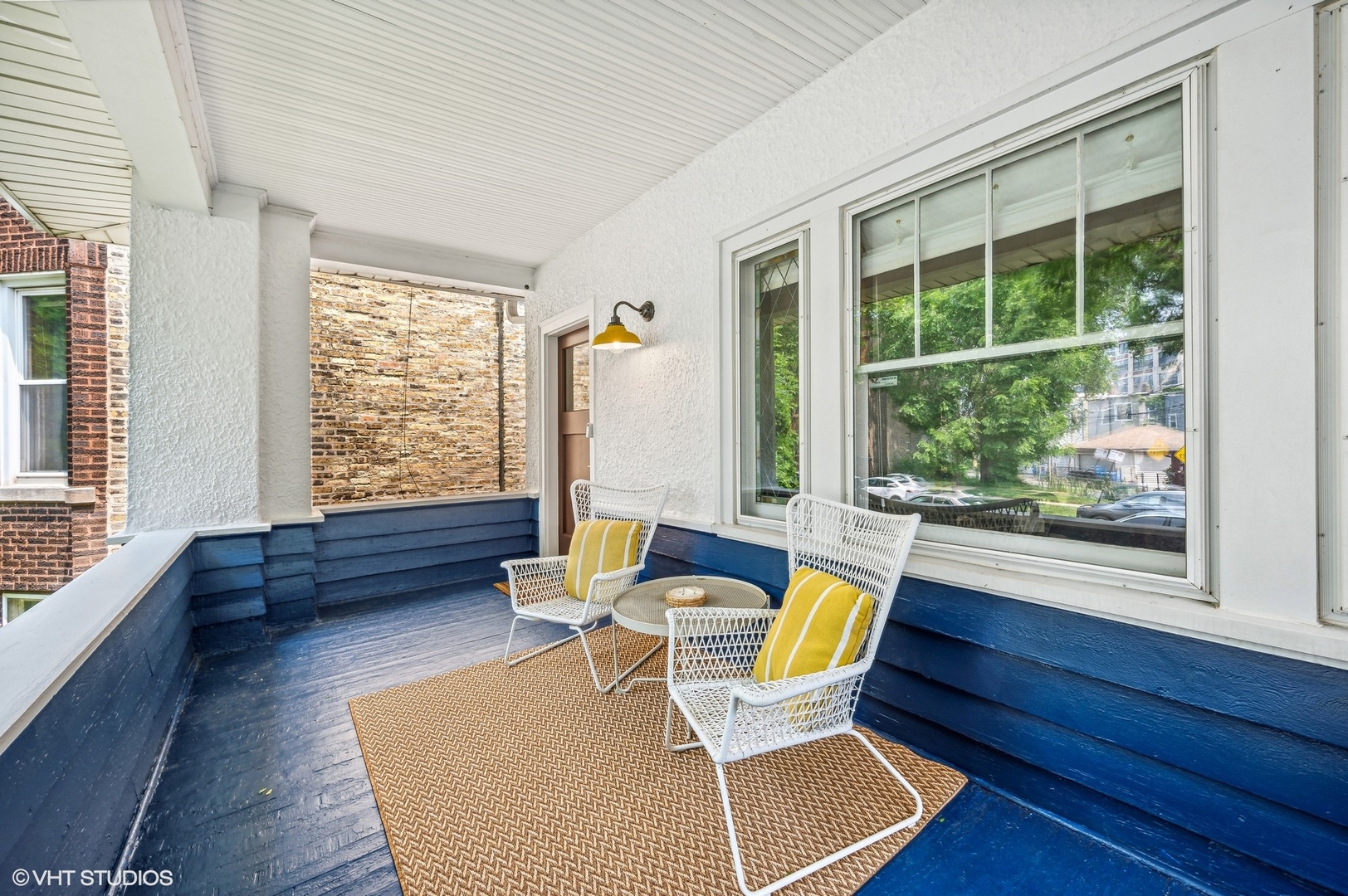 3125 North Springfield Avenue Chicago, IL 60618 - Photo 2 of 22 a living room with furniture and floor to ceiling windows