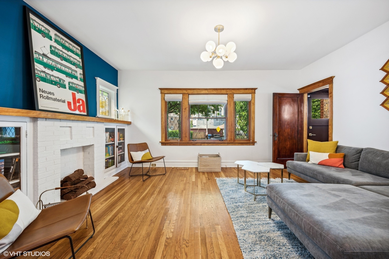 3125 North Springfield Avenue Chicago, IL 60618 - Photo 3 of 22 a living room with furniture and a fireplace