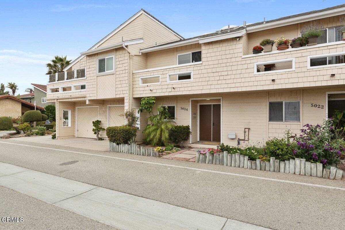 5024 West Wooley Road Oxnard, CA 93035 - Photo 1 of 33 front view of a house with a small yard