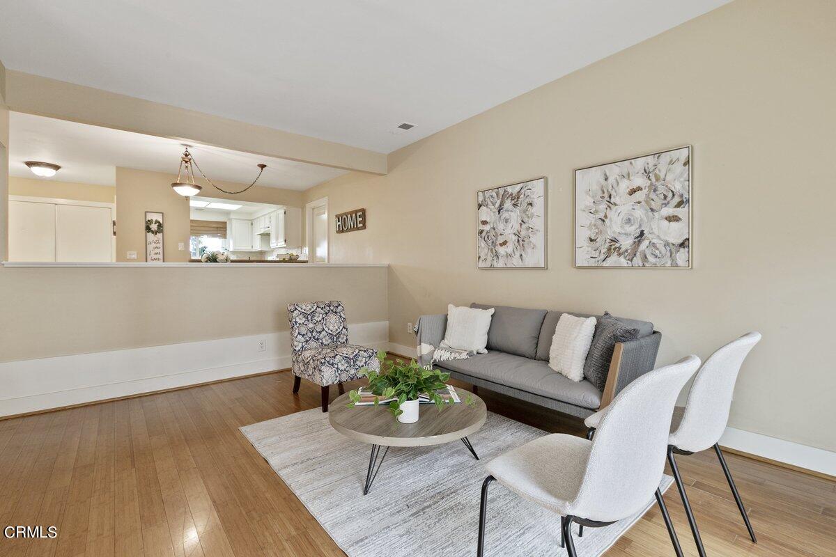 5024 West Wooley Road Oxnard, CA 93035 - Photo 5 of 33 a living room with furniture and wooden floor