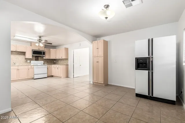 a living room with fireplace
