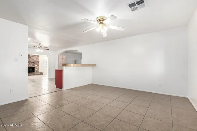 a front view of a house with parking space