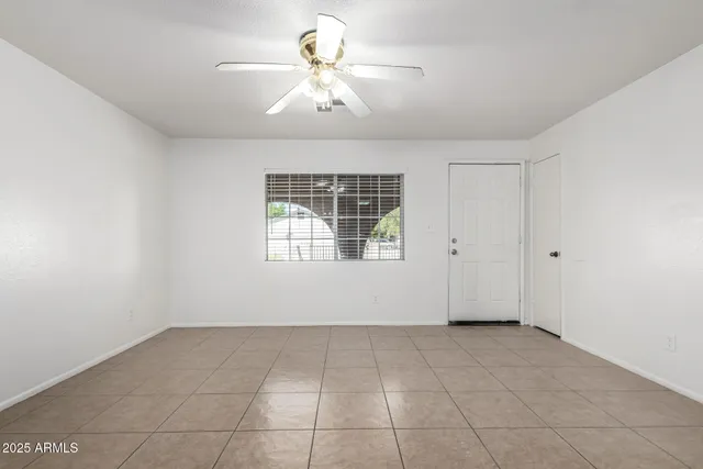 a view of kitchen with furniture and cabinets