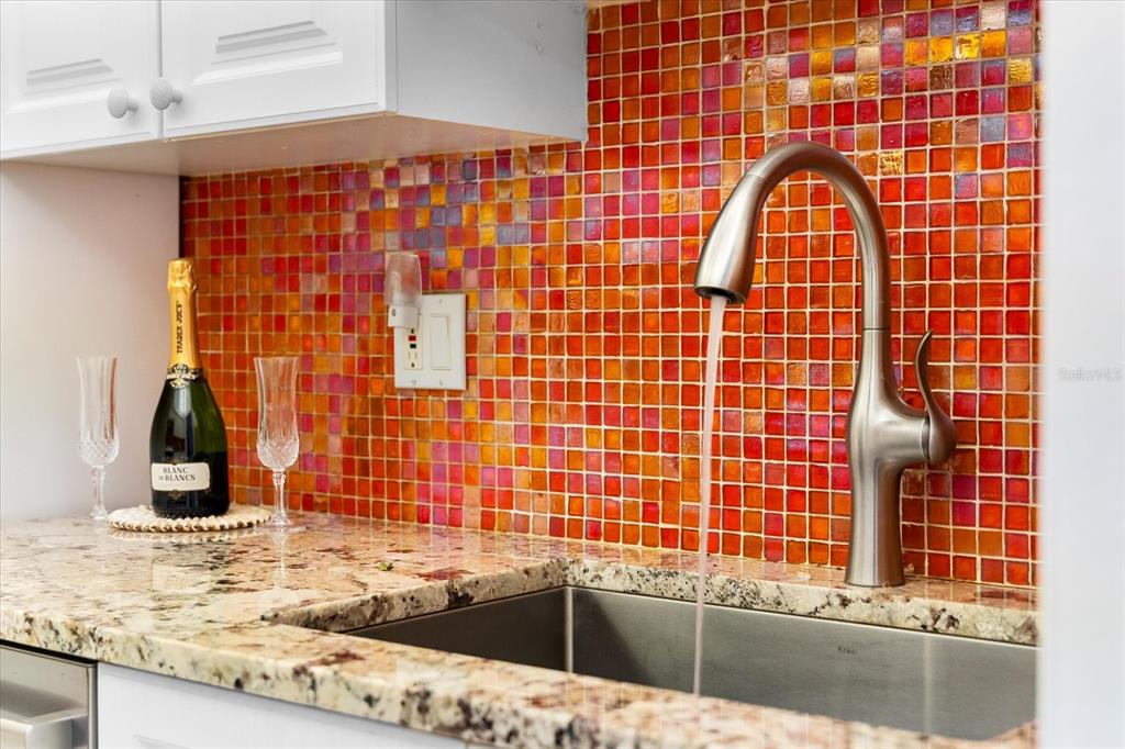 5641 Midnight Pass Road, Unit 902 Sarasota, FL 34242 - Photo 12 of 81 a view of bathroom with a granite countertop sink